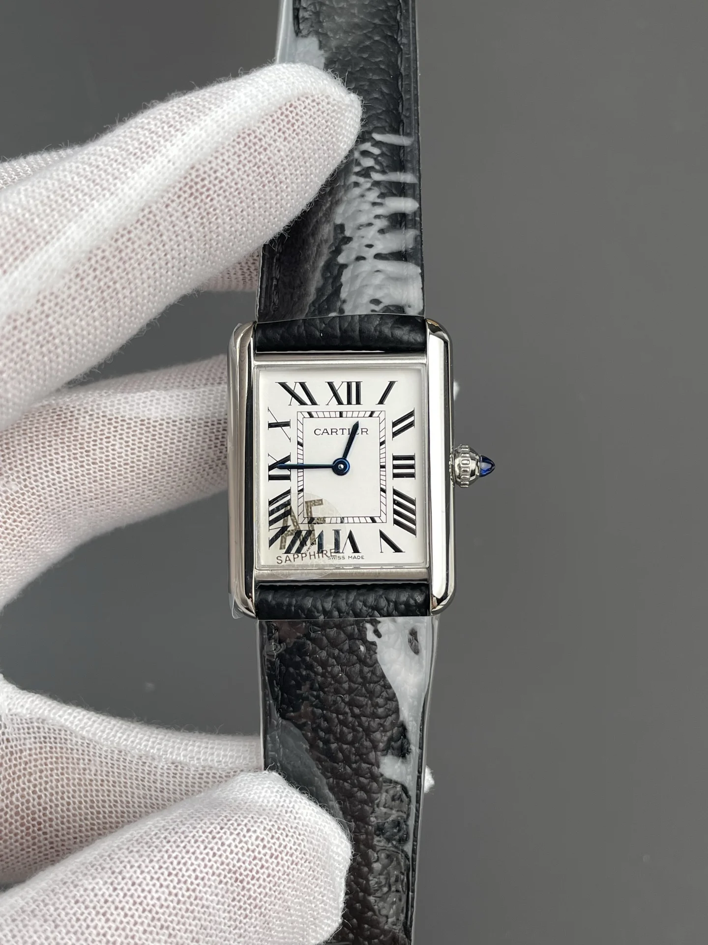Cartier Tank 33.7 × 25.5mm — photographed off the sweep