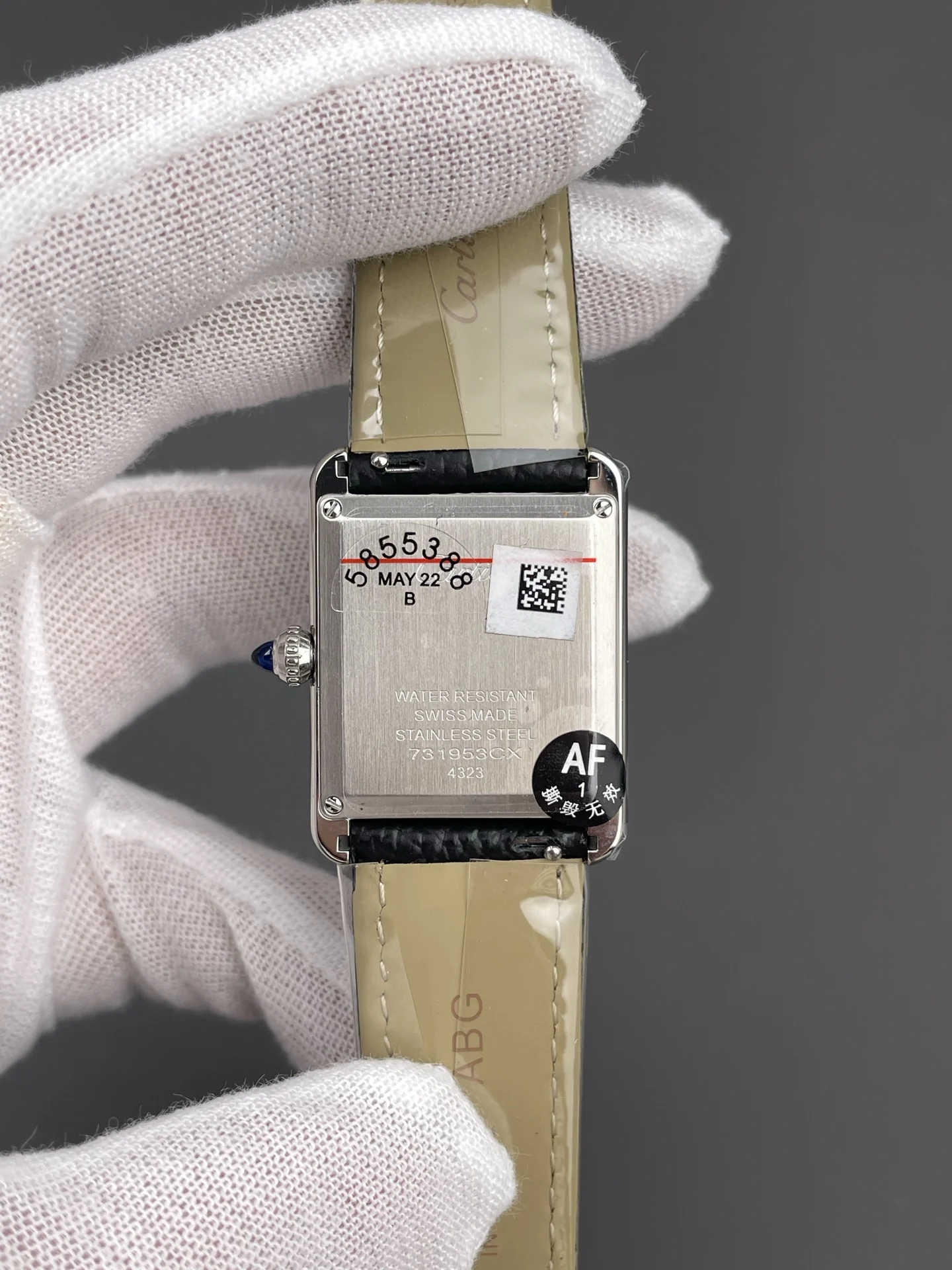 Cartier Tank 33.7 × 25.5mm — photographed off the sweep