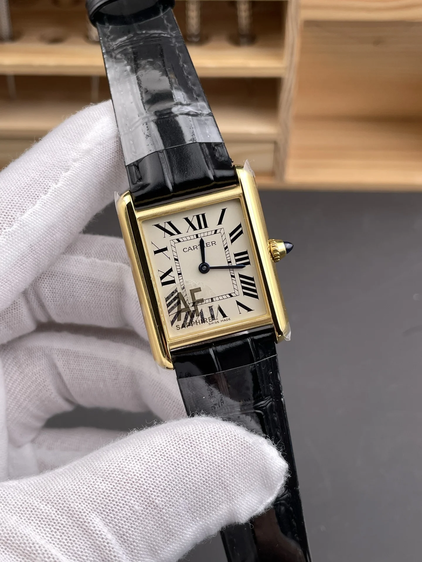 Cartier Tank 33.7 × 25.5mm — photographed off the sweep