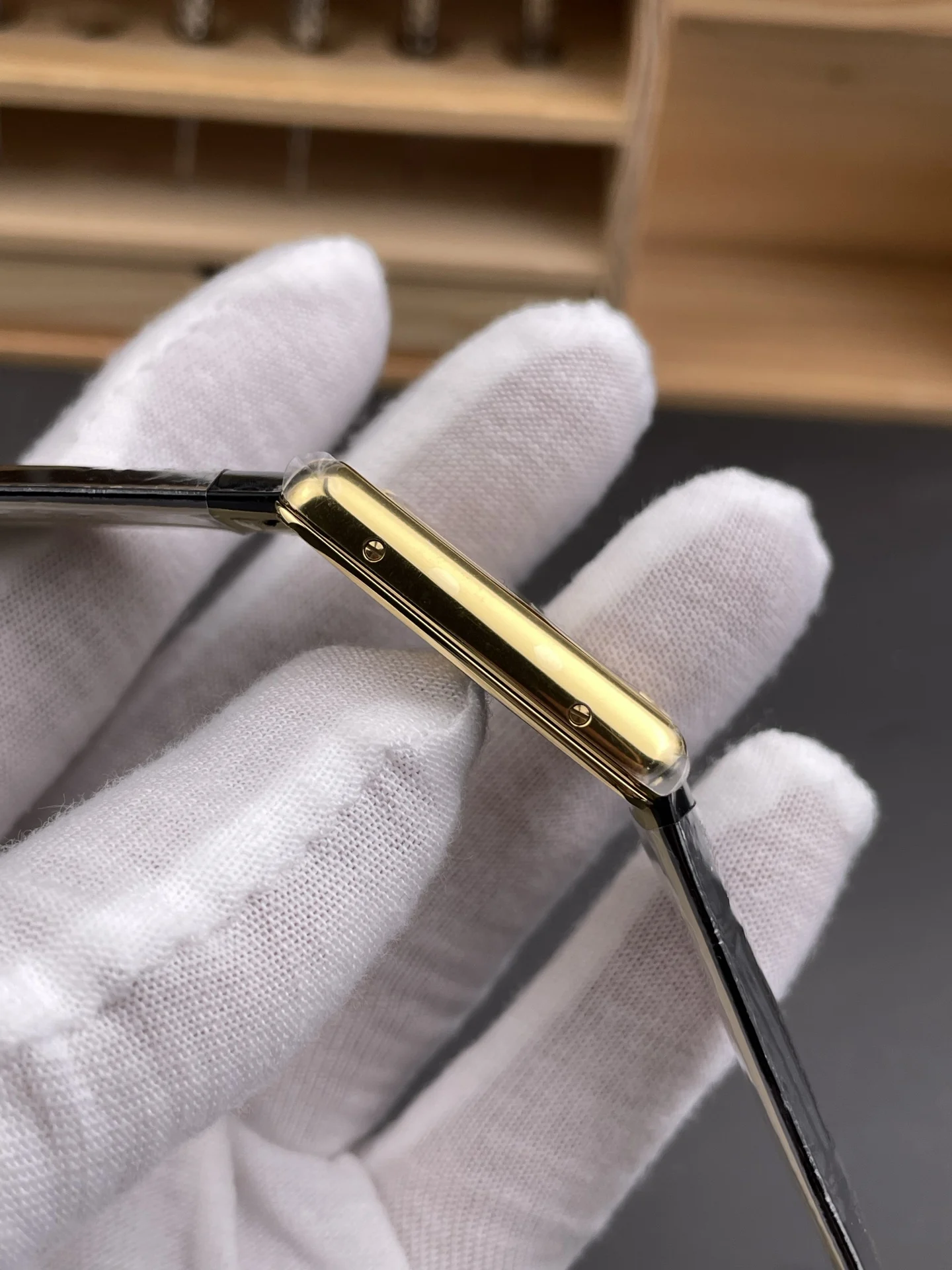 Cartier Tank 33.7 × 25.5mm — photographed off the sweep