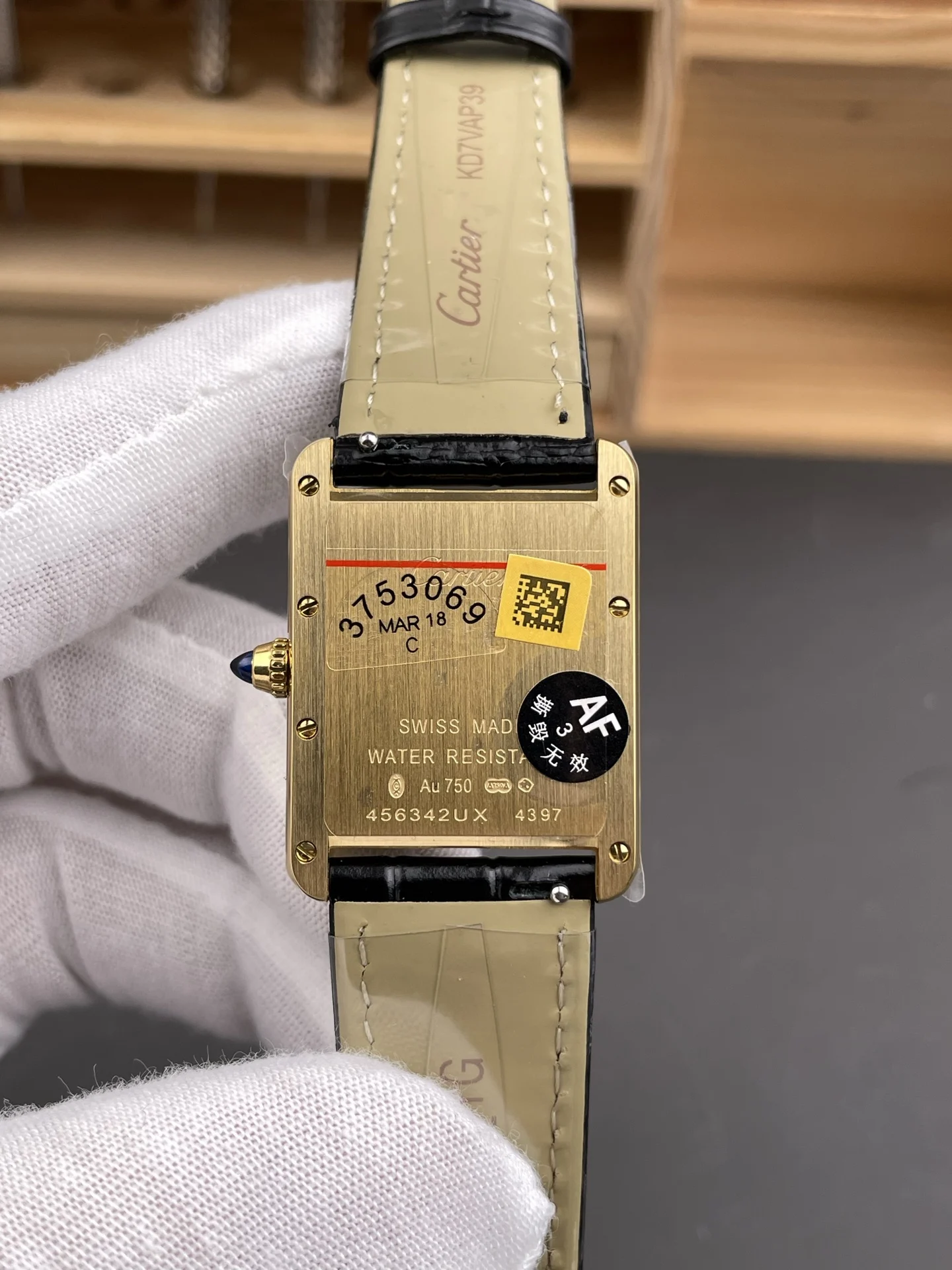 Cartier Tank 33.7 × 25.5mm — photographed off the sweep