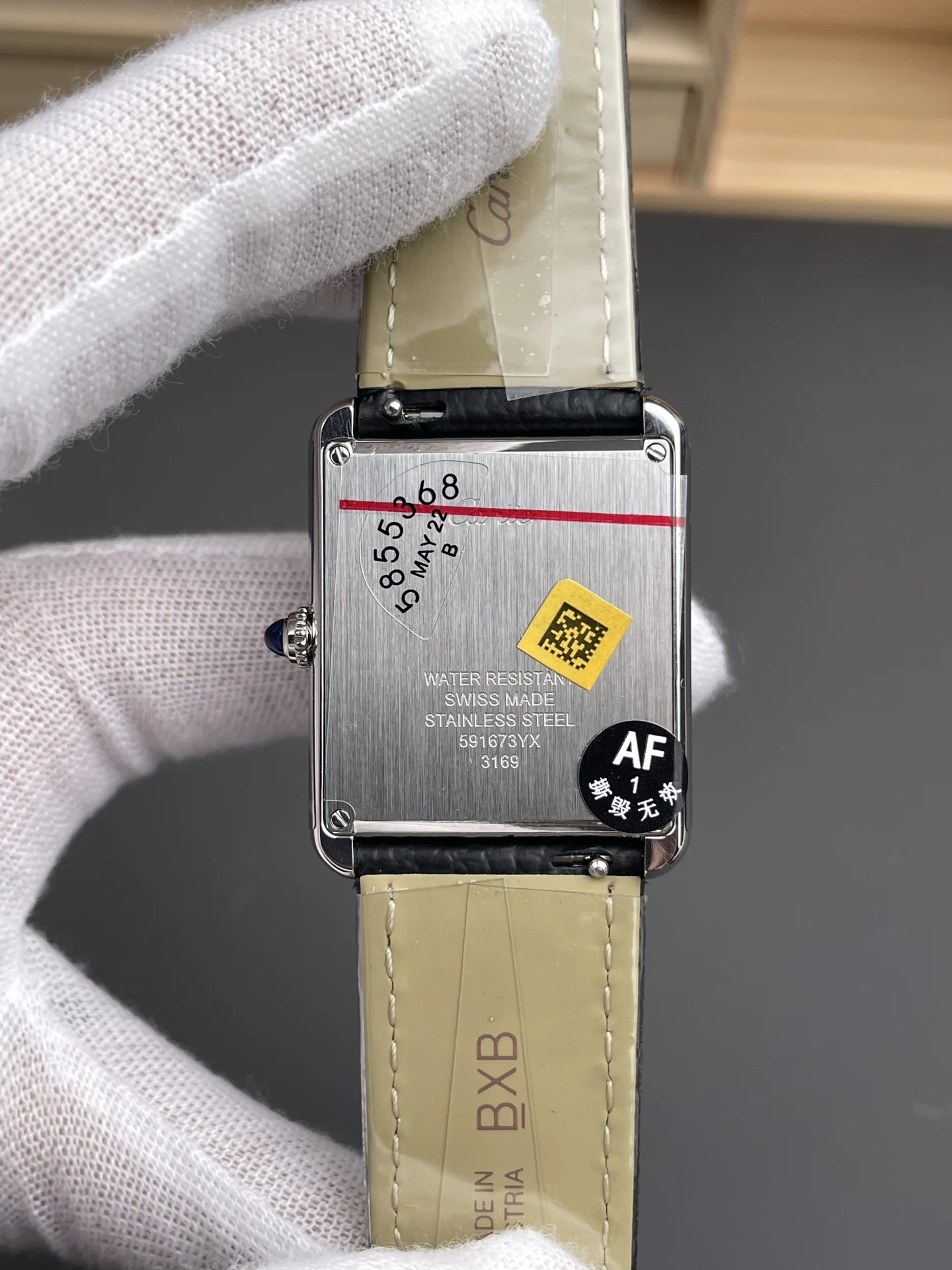 Cartier Tank 34.8 × 27.4mm — photographed off the sweep