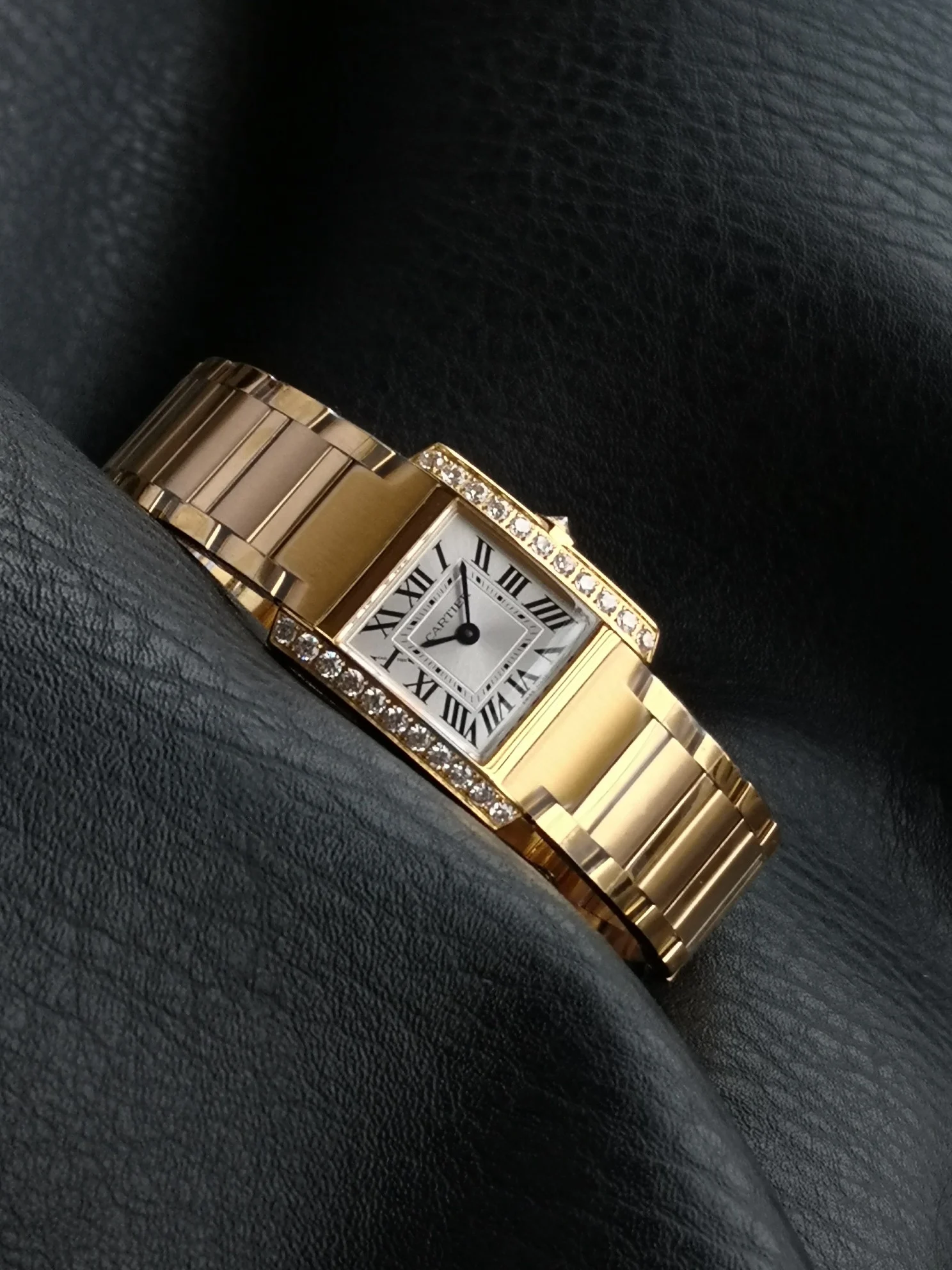 Cartier Tank Française Champagne Platinum — photographed off the sweep