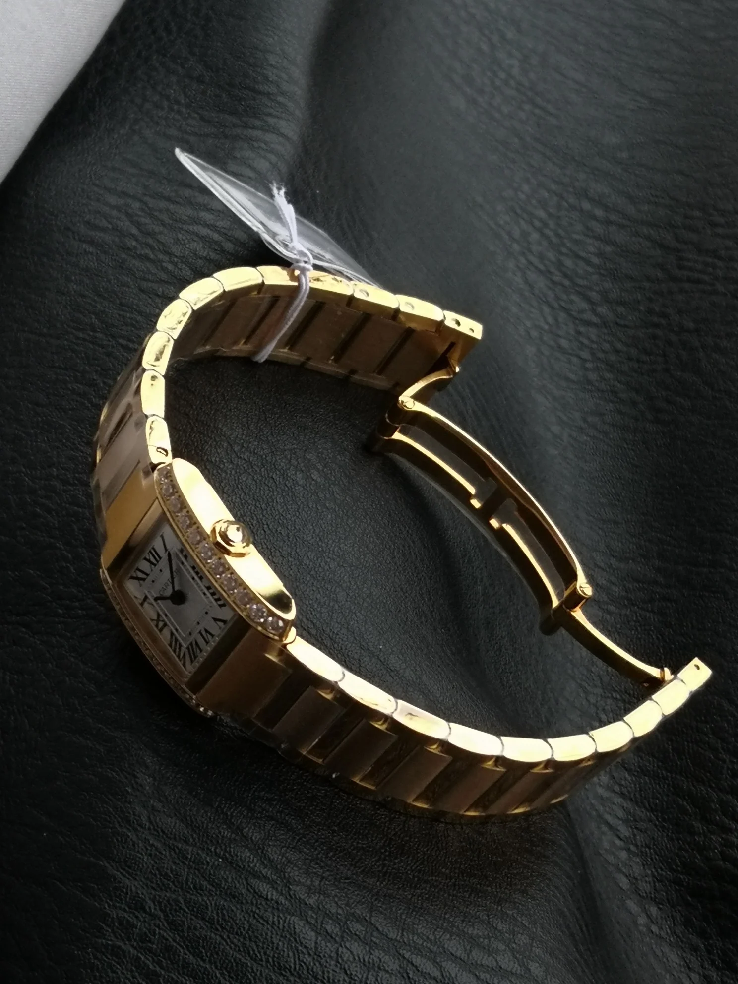 Cartier Tank Française Champagne Platinum — photographed off the sweep