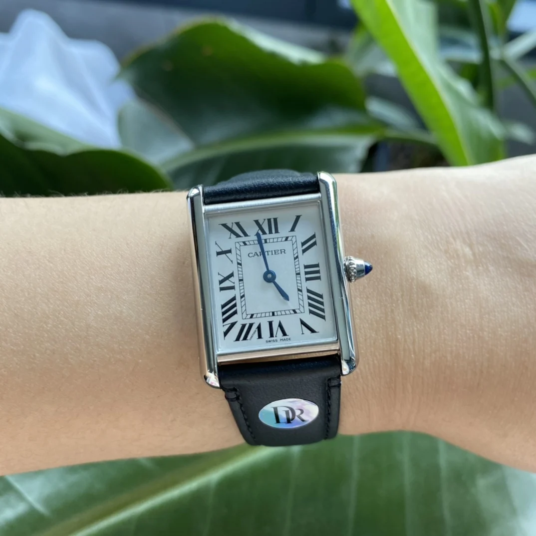 Cartier Tank Must 22.5mm — photographed off the sweep