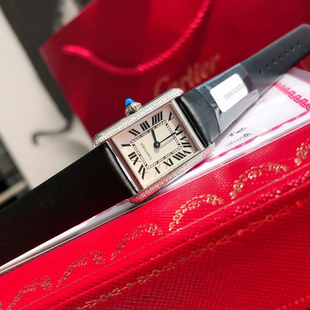 Cartier Tank Must Steel Blue Dial 33.7mm — photographed off the sweep