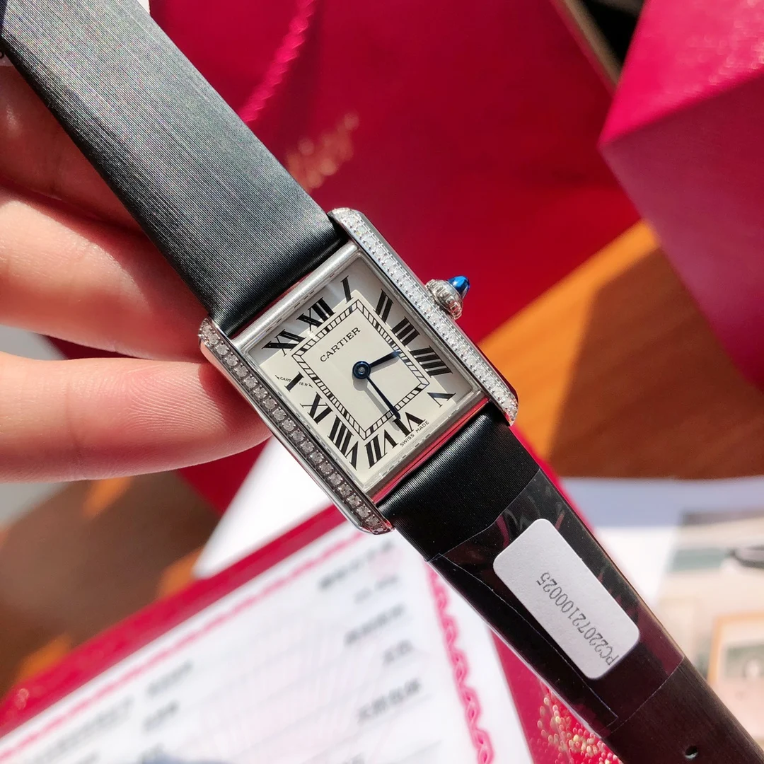 Cartier Tank Must Steel Blue Dial 33.7mm — photographed off the sweep