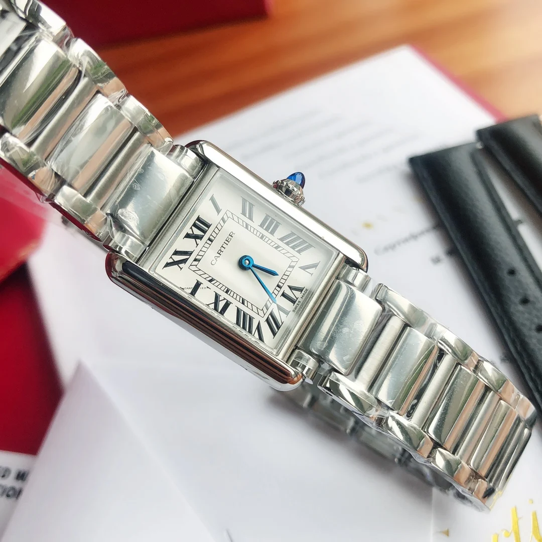 Cartier Tank Must Steel Blue Dial 33.7mm — photographed off the sweep