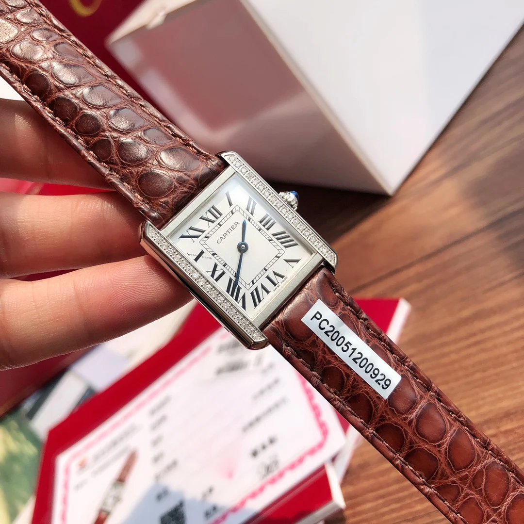 Cartier Tank Steel 31mm — photographed off the sweep