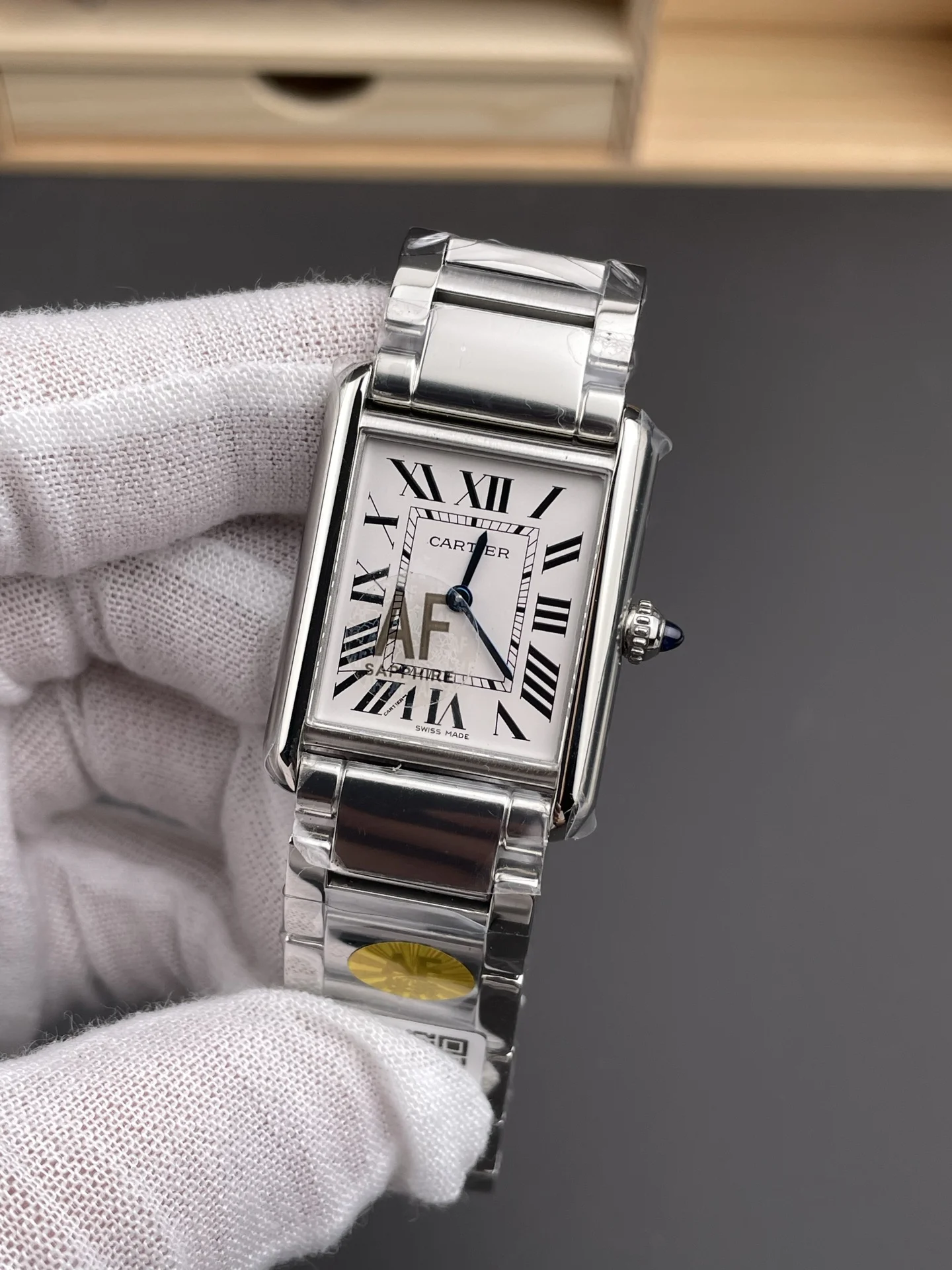 Cartier Tank Steel 33.7 × 25.5mm — photographed off the sweep