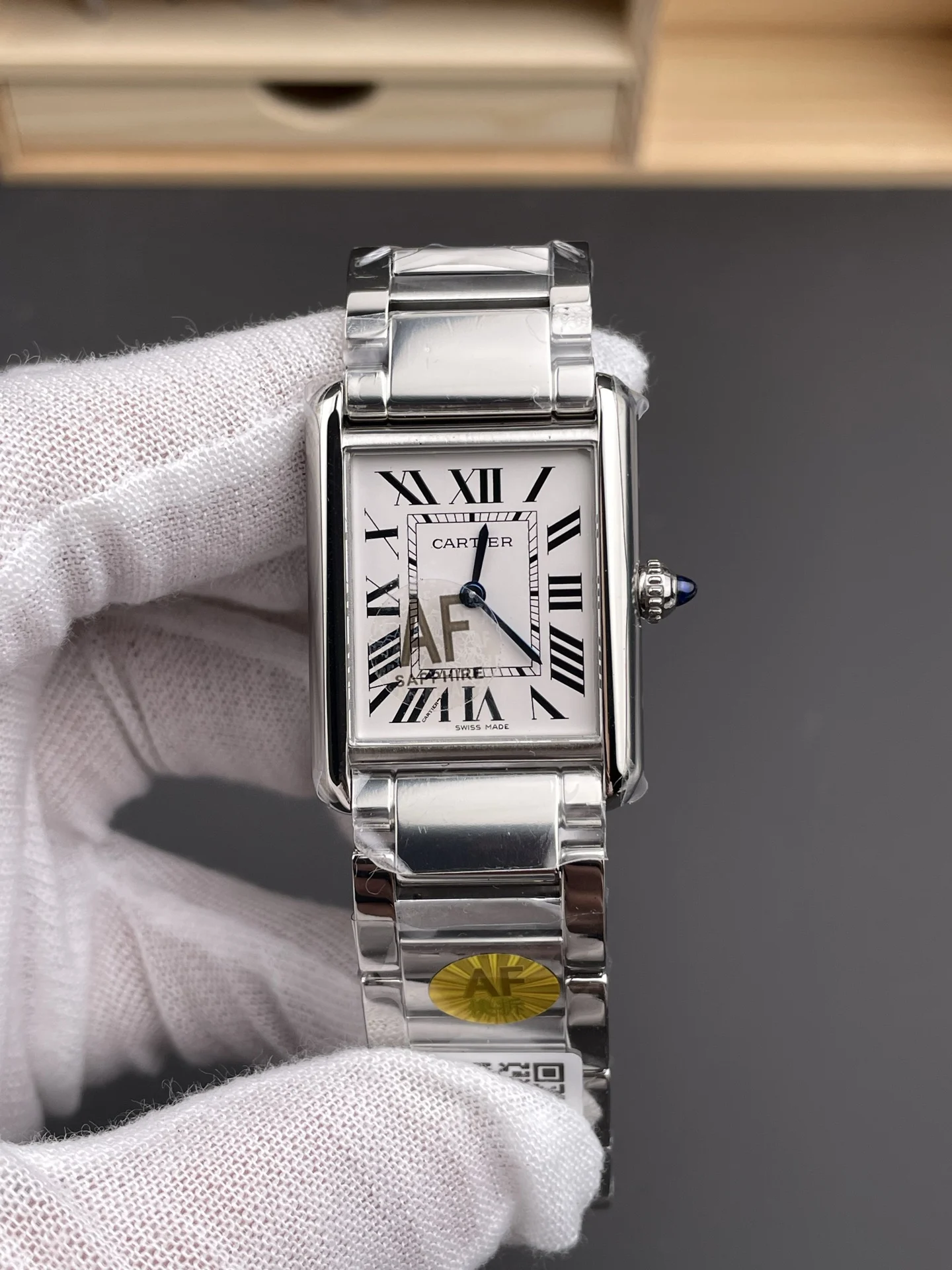 Cartier Tank Steel 33.7 × 25.5mm — photographed off the sweep