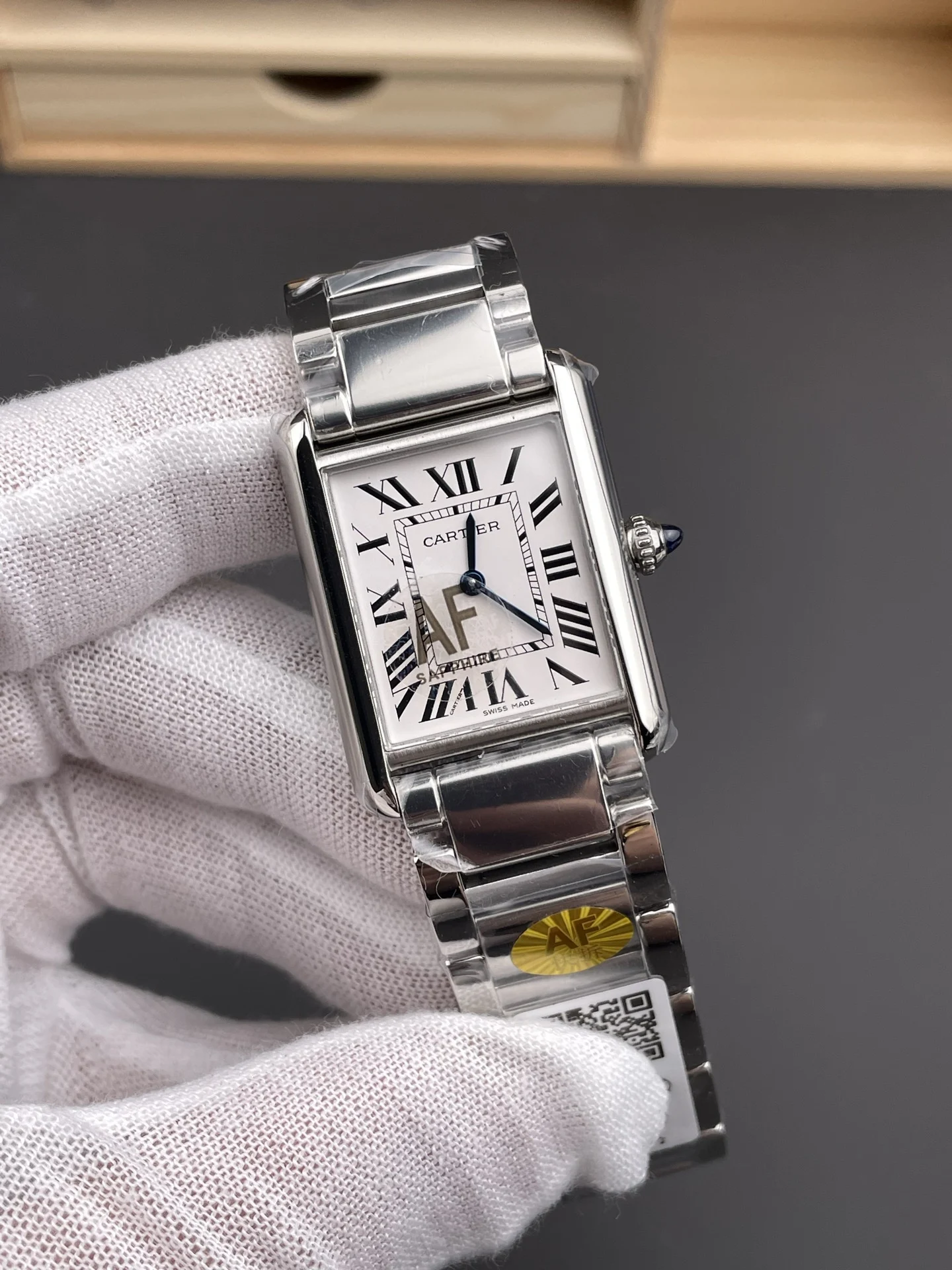 Cartier Tank Steel 33.7 × 25.5mm — photographed off the sweep