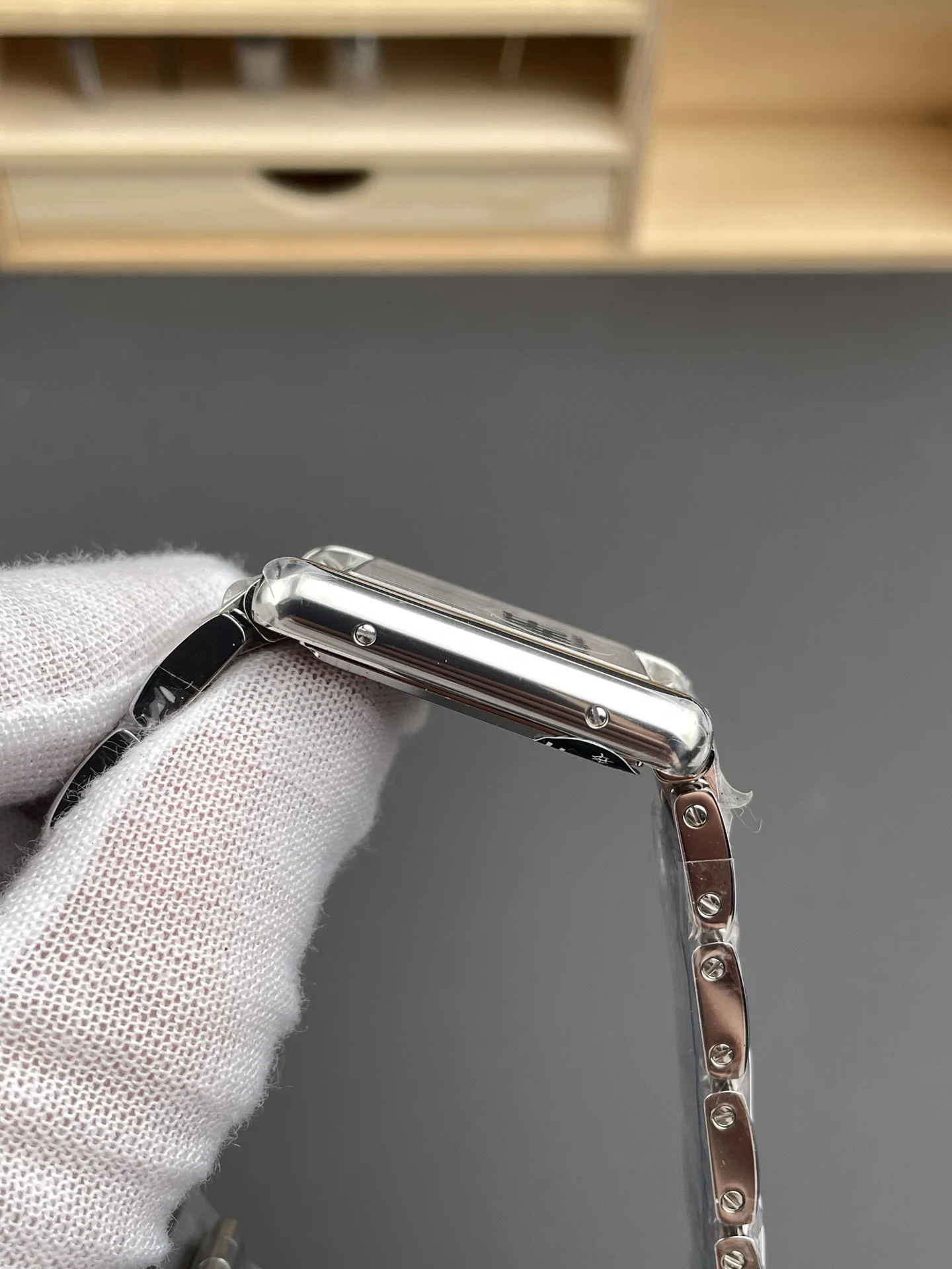 Cartier Tank Steel 33.7 × 25.5mm — photographed off the sweep