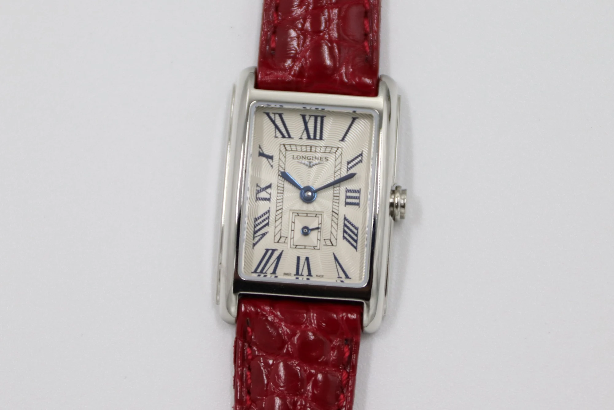 Cartier Tank Steel Blue Dial 20.8 × 32mm — photographed off the sweep