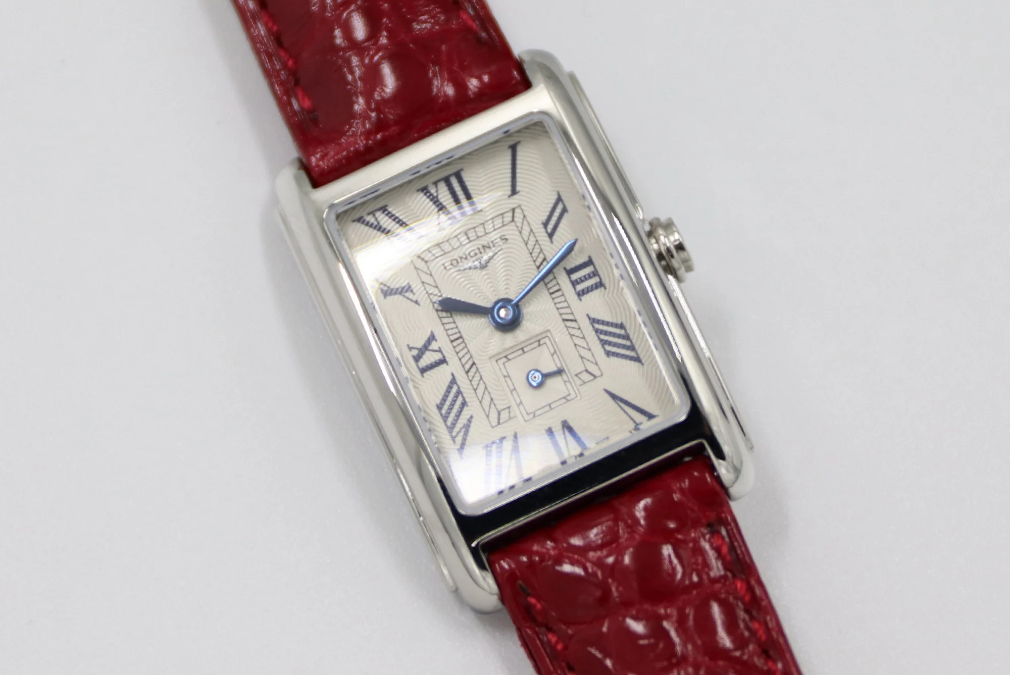 Cartier Tank Steel Blue Dial 20.8 × 32mm — photographed off the sweep