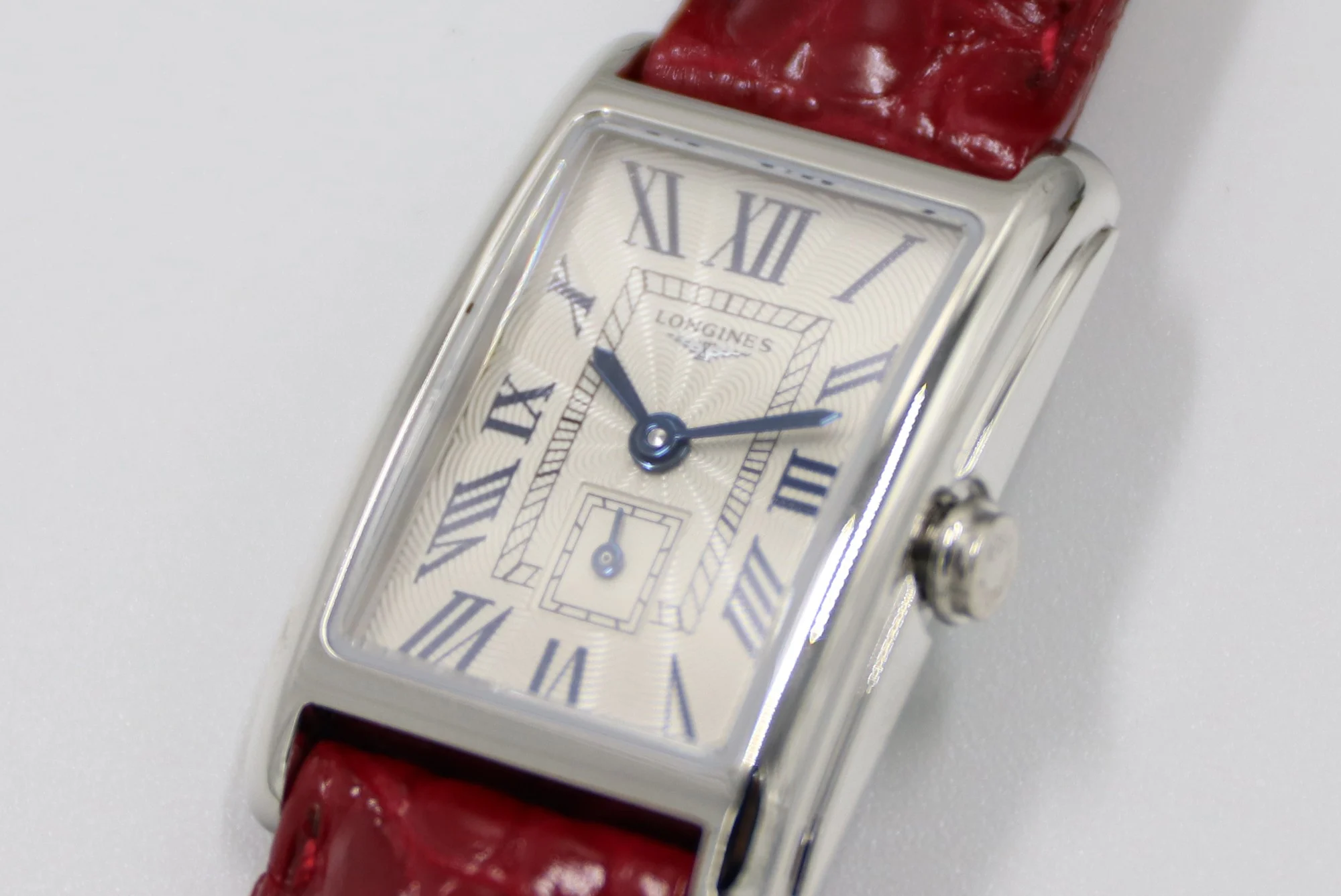 Cartier Tank Steel Blue Dial 20.8 × 32mm — photographed off the sweep