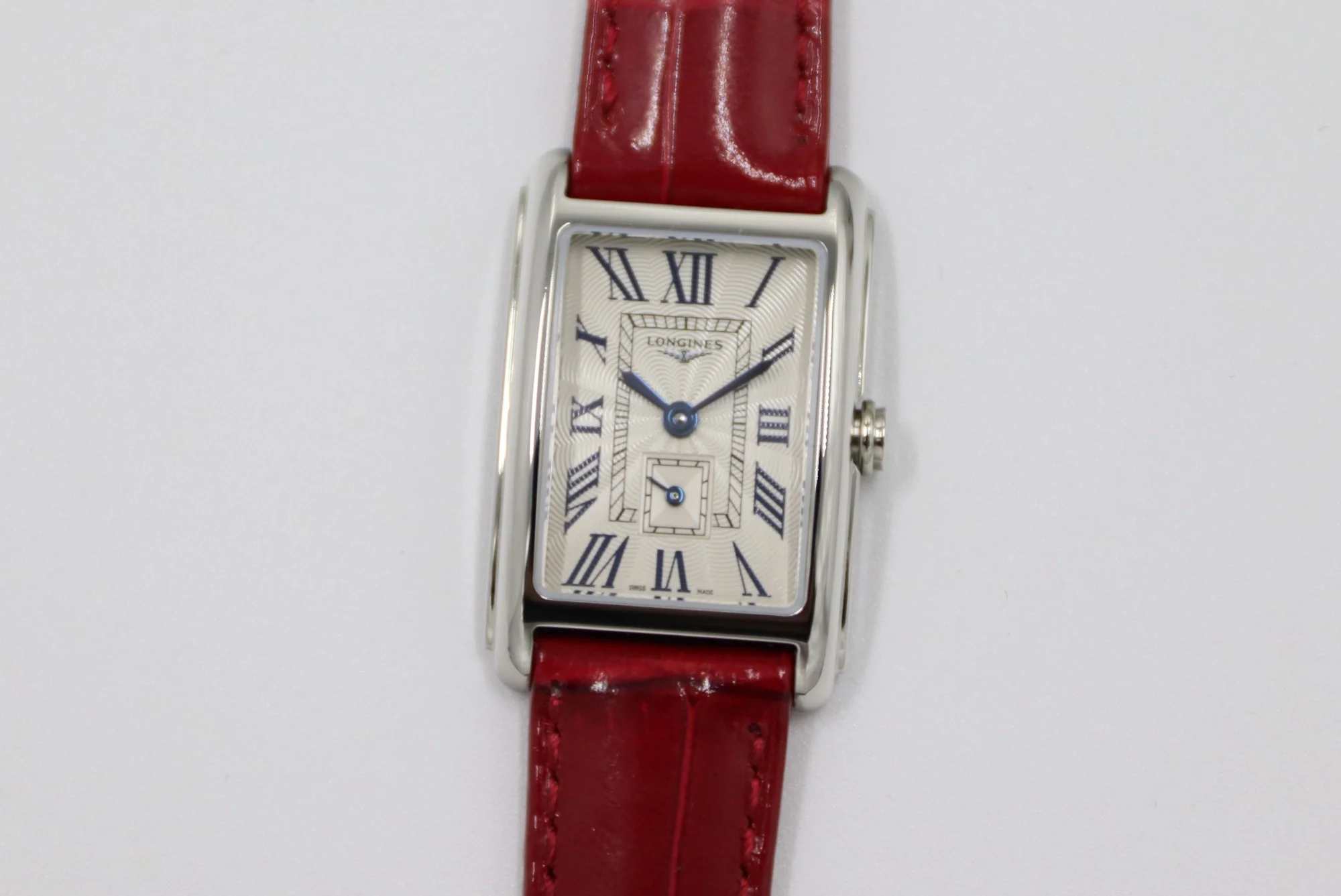 Cartier Tank Steel Blue Dial 20.8 × 32mm — photographed off the sweep