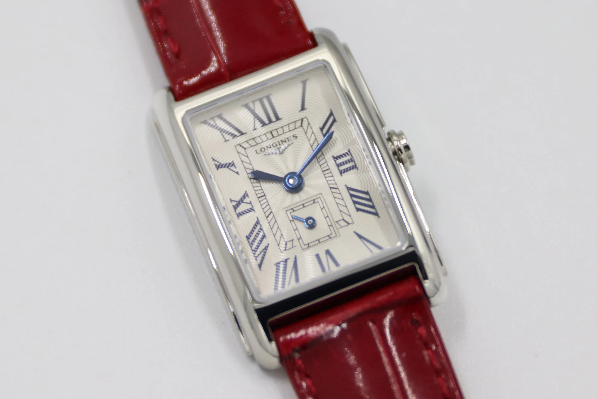 Cartier Tank Steel Blue Dial 20.8 × 32mm — photographed off the sweep