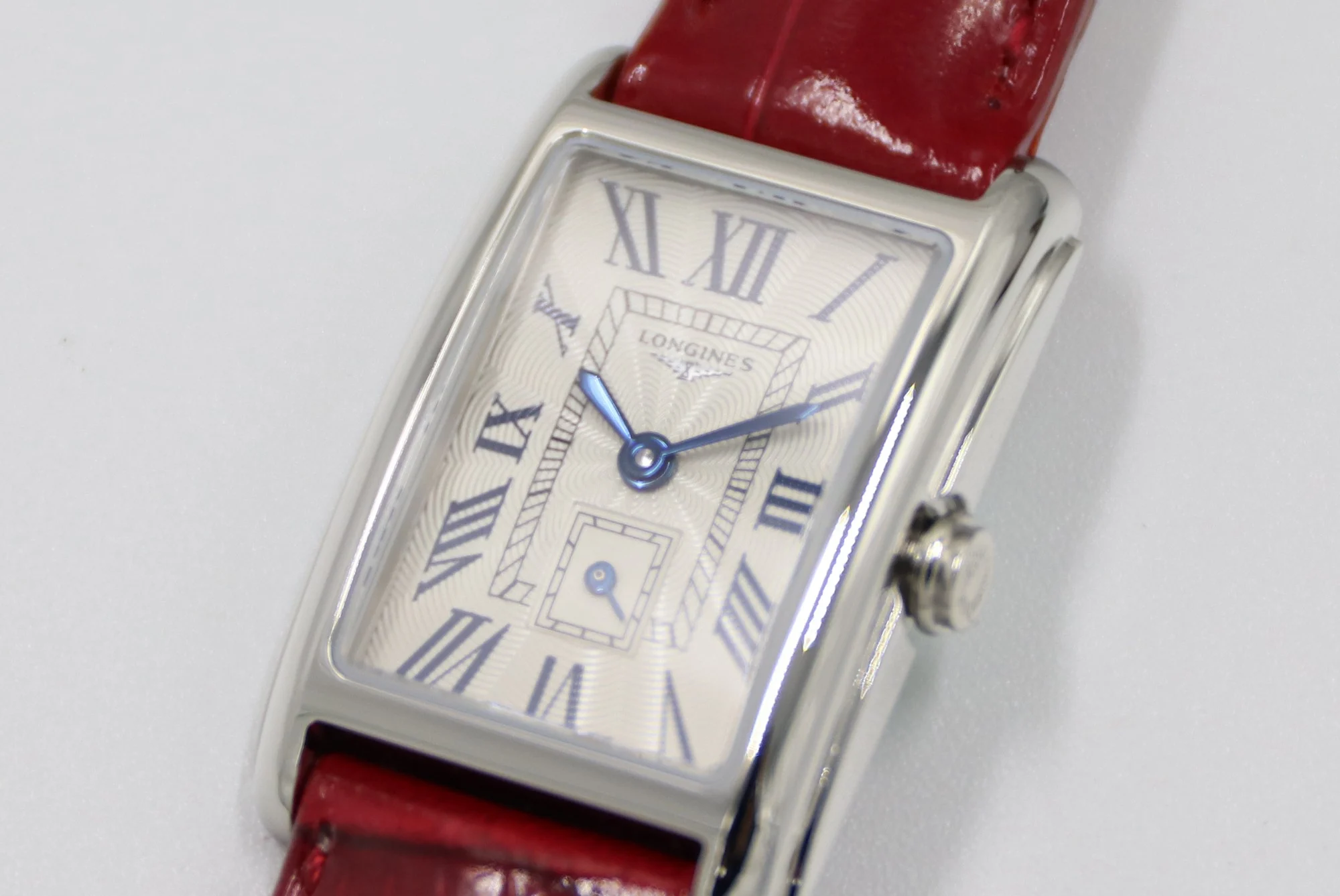Cartier Tank Steel Blue Dial 20.8 × 32mm — photographed off the sweep