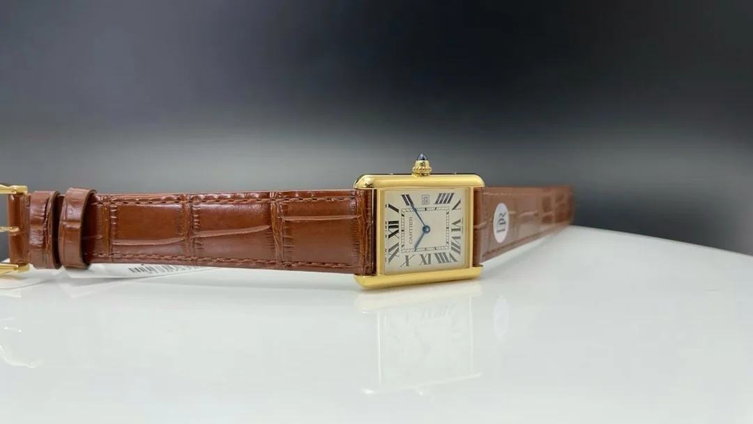 Cartier Tank Steel Blue Dial 24mm — photographed off the sweep