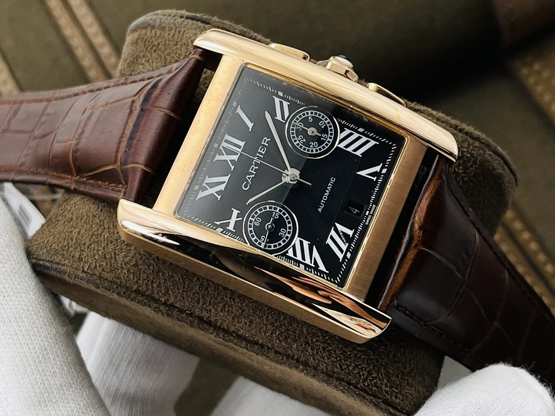 Cartier Tank Steel Blue Dial 34.3mm — photographed off the sweep