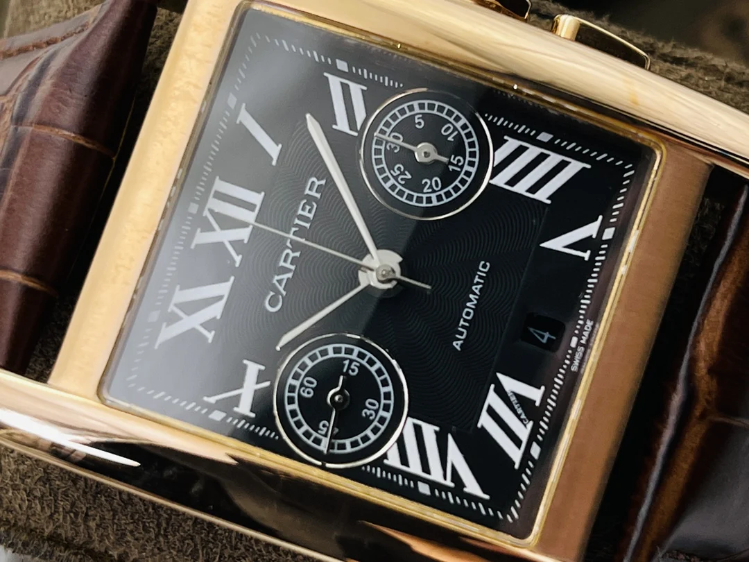 Cartier Tank Steel Blue Dial 34.3mm — photographed off the sweep