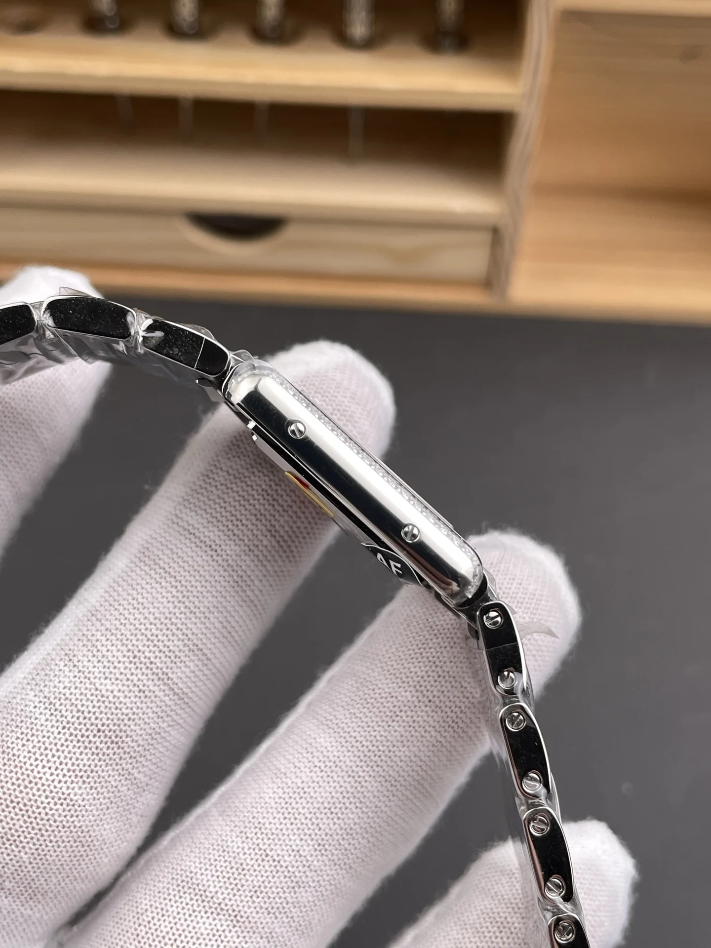 Cartier Tank Steel Diamond-Set 29.5 × 22mm — photographed off the sweep