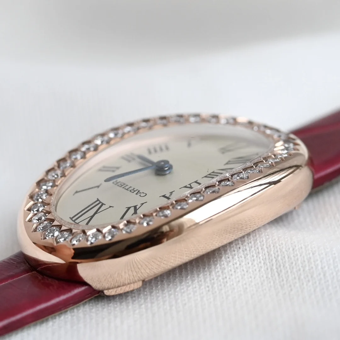 Cartier The case features a one-piece molded elliptical arc design — photographed off the sweep