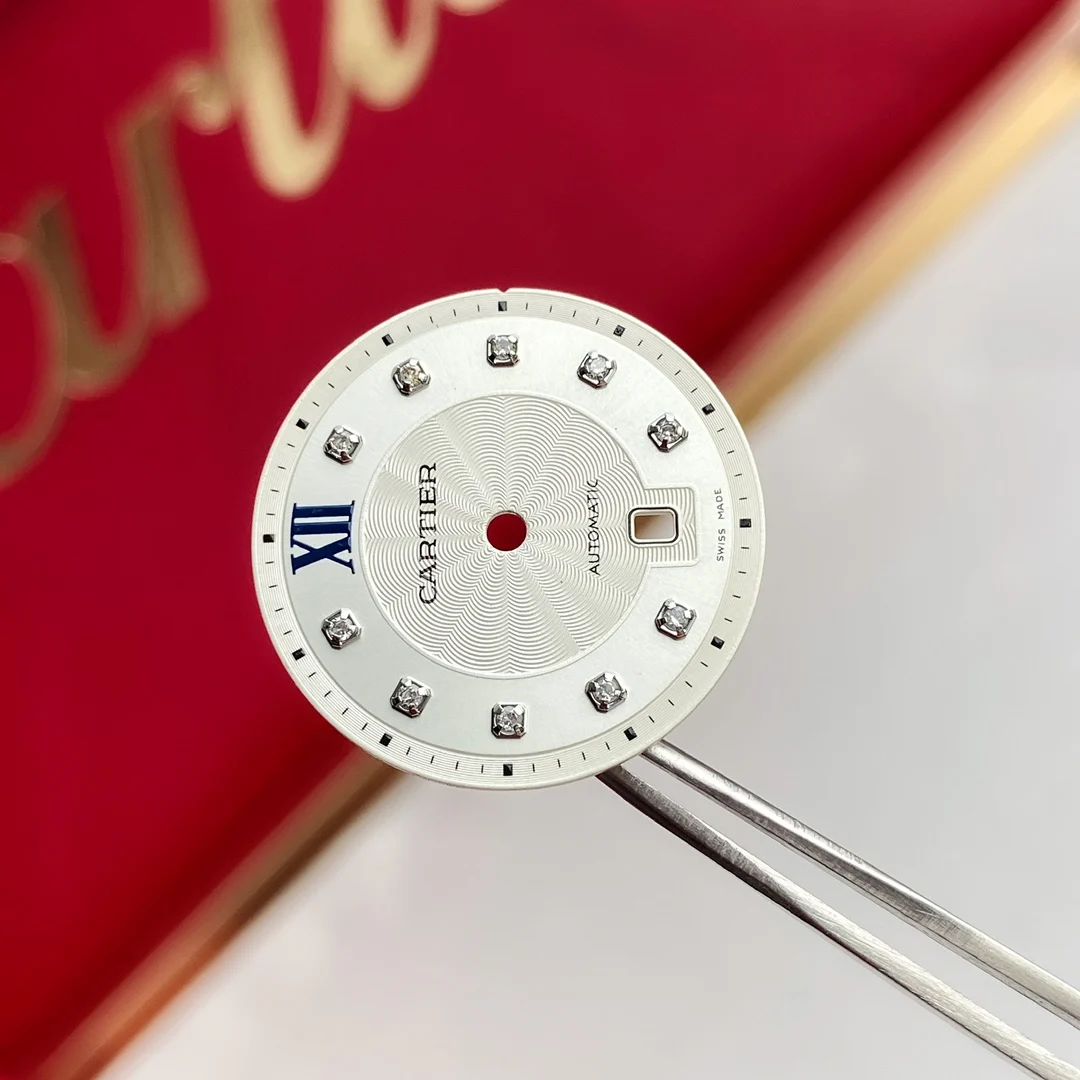 Carved sunburst pattern + 10 natural diamond hour markers — photographed off the sweep