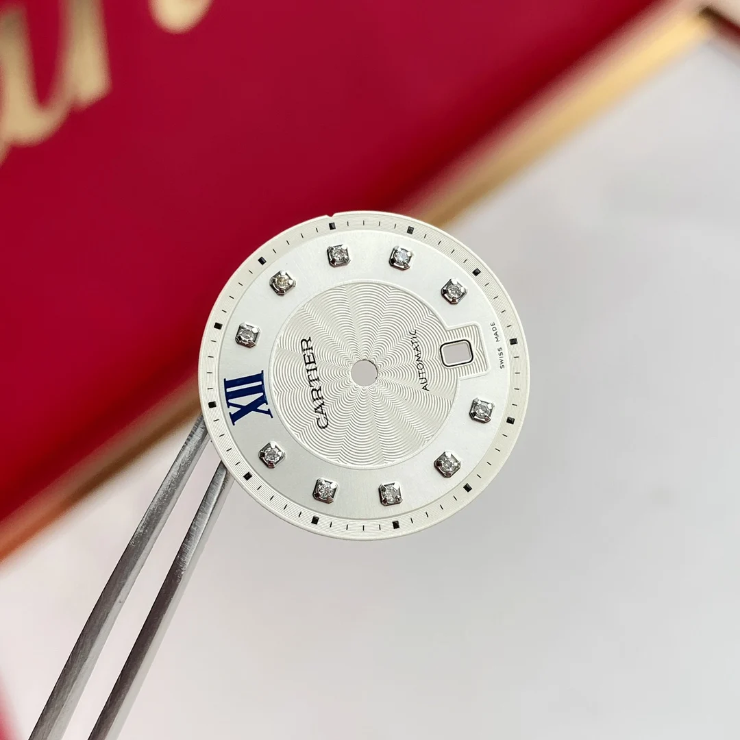 Carved sunburst pattern + 10 natural diamond hour markers — photographed off the sweep