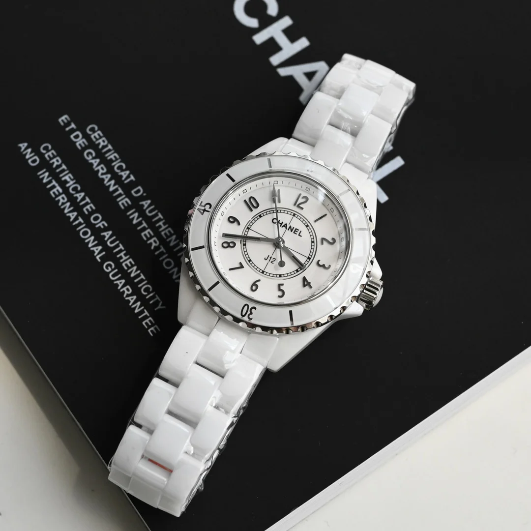Chanel J12 Ceramic Black Dial Diamond-Set 33mm — photographed off the sweep