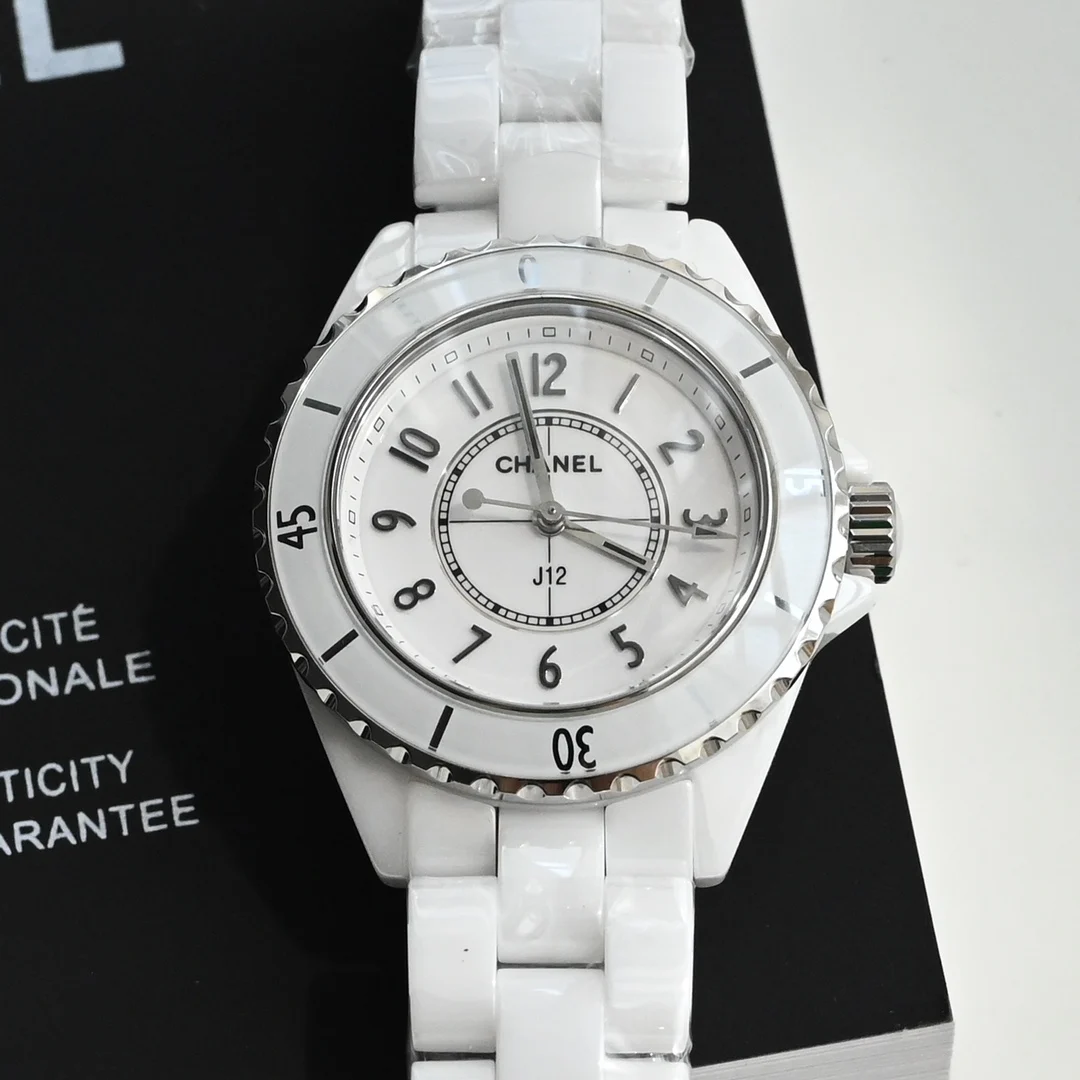 Chanel J12 Ceramic Black Dial Diamond-Set 33mm — photographed off the sweep