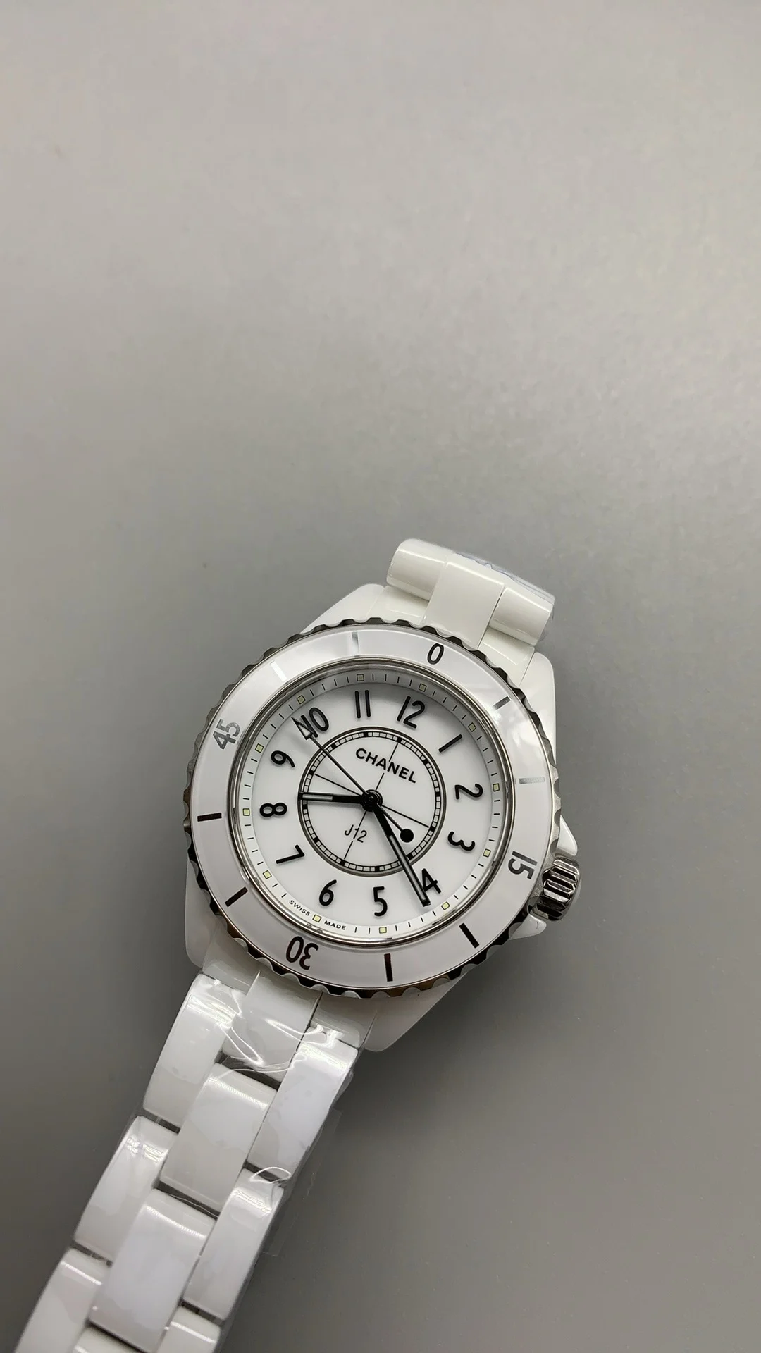 Chanel J12 Ceramic White Dial — photographed off the sweep