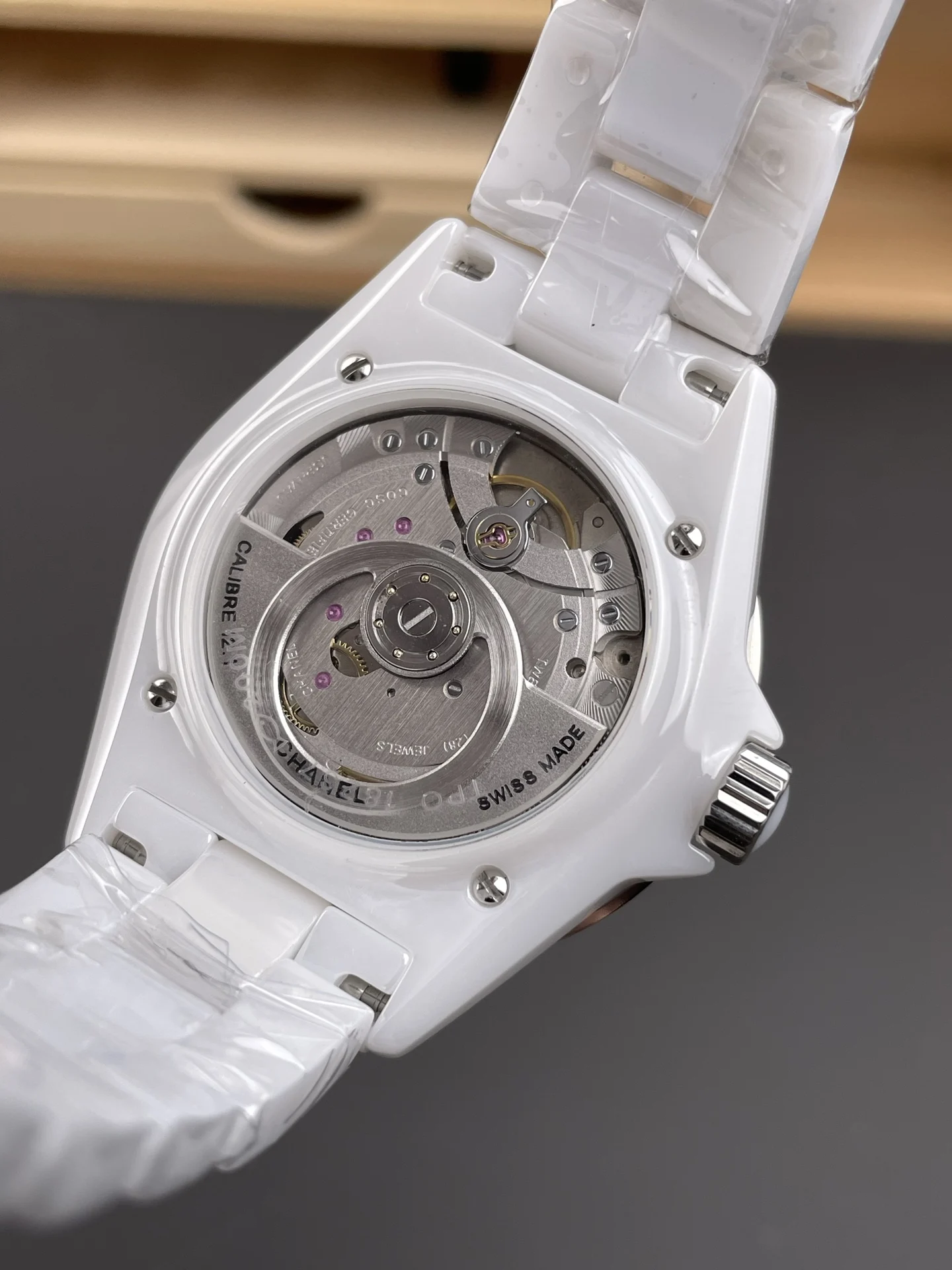 Chanel J12 White Dial — photographed off the sweep