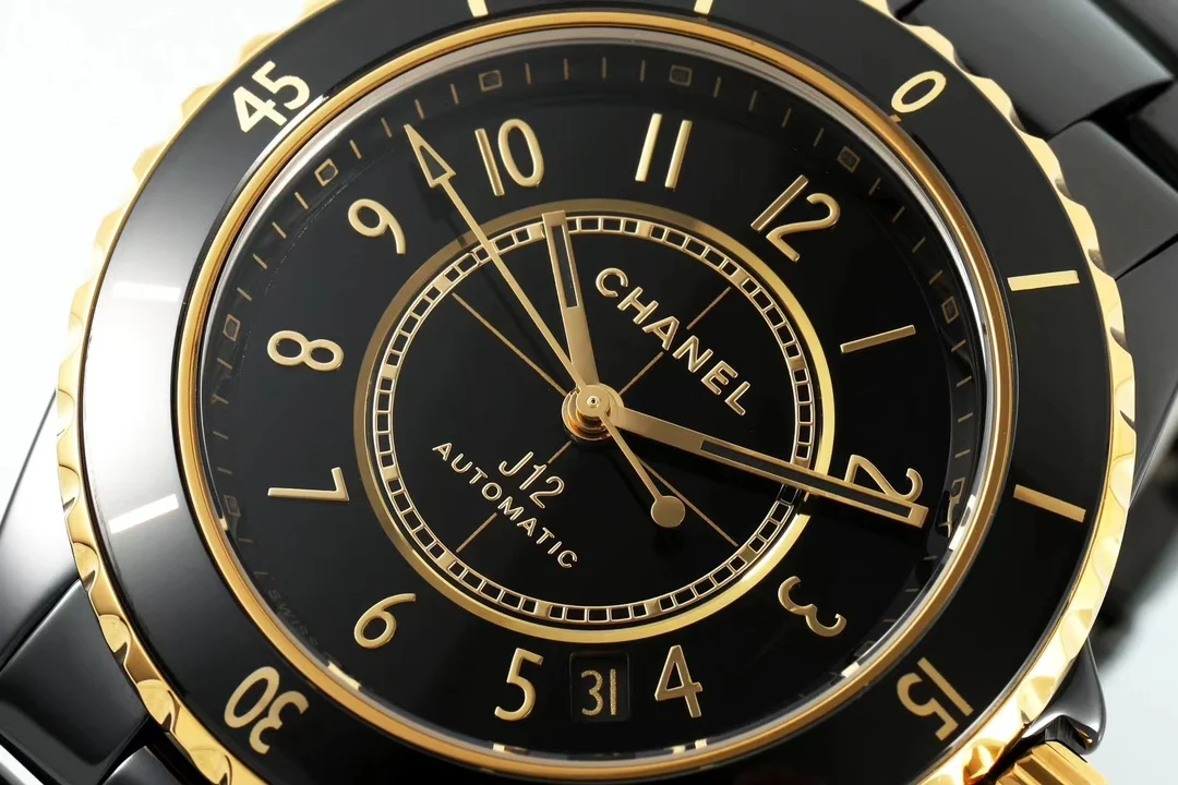 Chanel J12 Yellow Gold Black Dial — photographed off the sweep