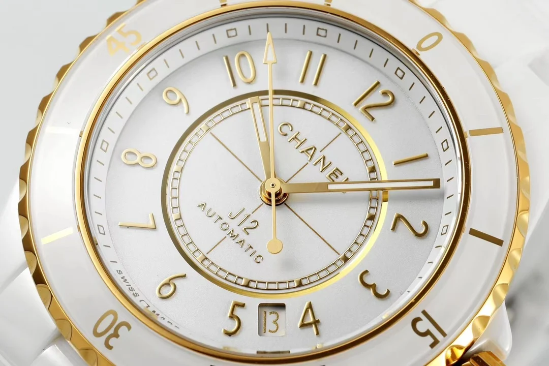 Chanel J12 Yellow Gold White Dial — photographed off the sweep