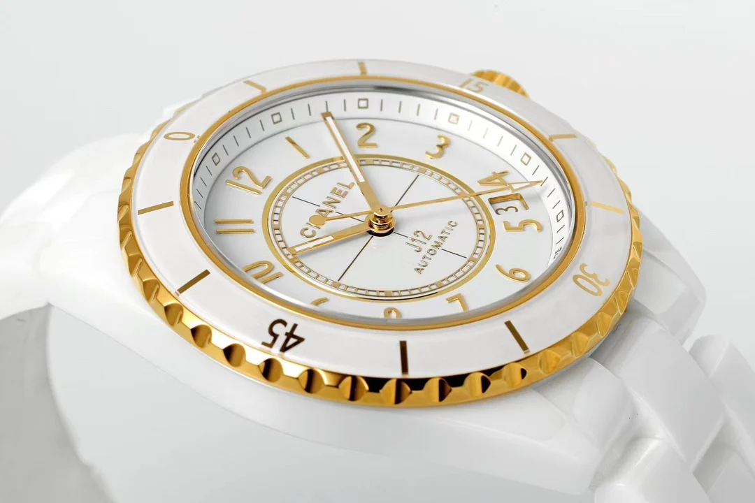 Chanel J12 Yellow Gold White Dial — photographed off the sweep