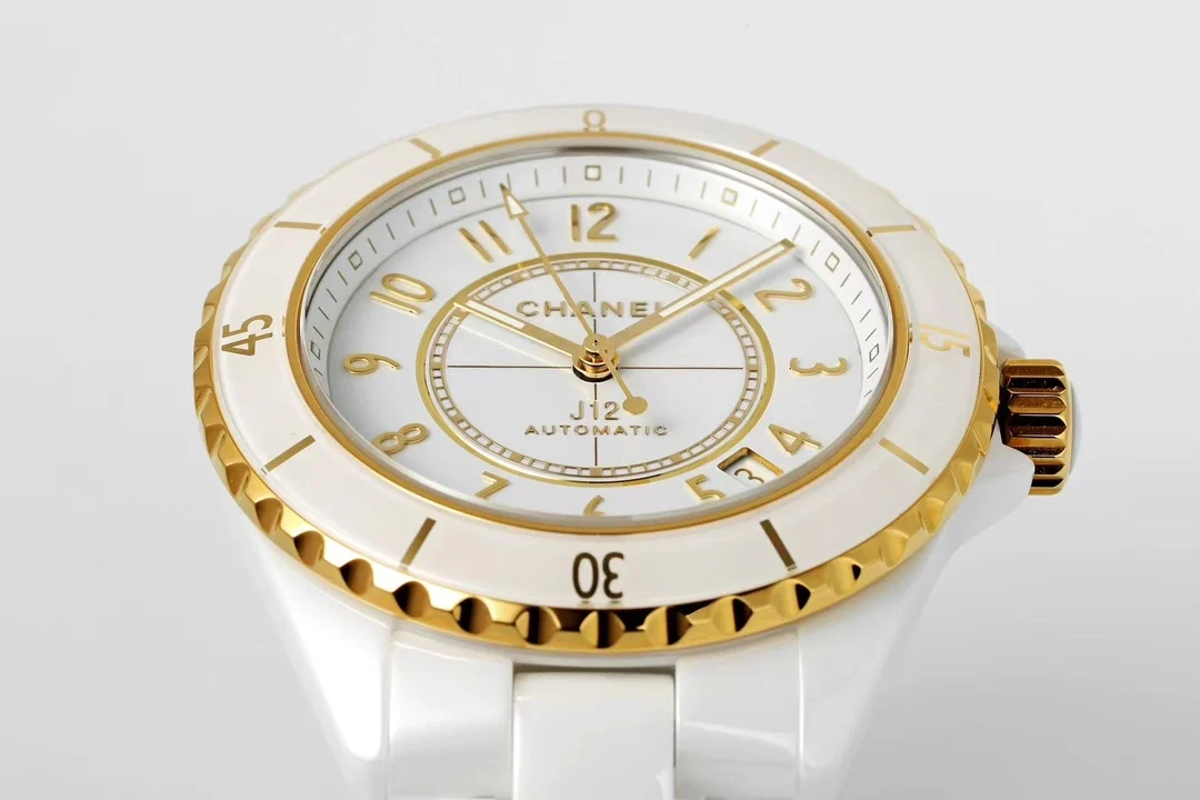 Chanel J12 Yellow Gold White Dial — photographed off the sweep