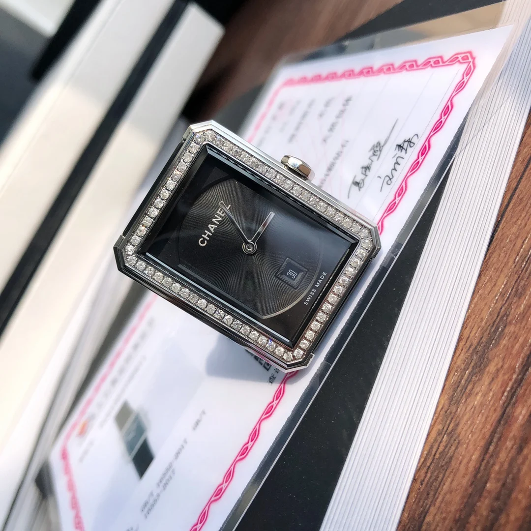 Chanel Steel 26.7 × 34.6mm — photographed off the sweep