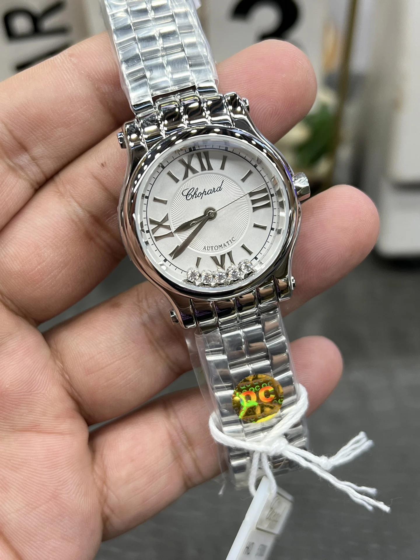 Chopard Happy Diamonds Steel 33mm — photographed off the sweep