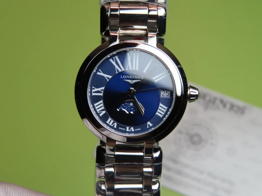 etc Longines New Heart Moon Collection Women's Model Watch — photographed off the sweep