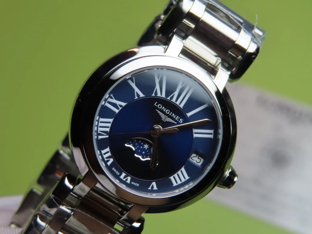 etc Longines New Heart Moon Collection Women's Model Watch — photographed off the sweep