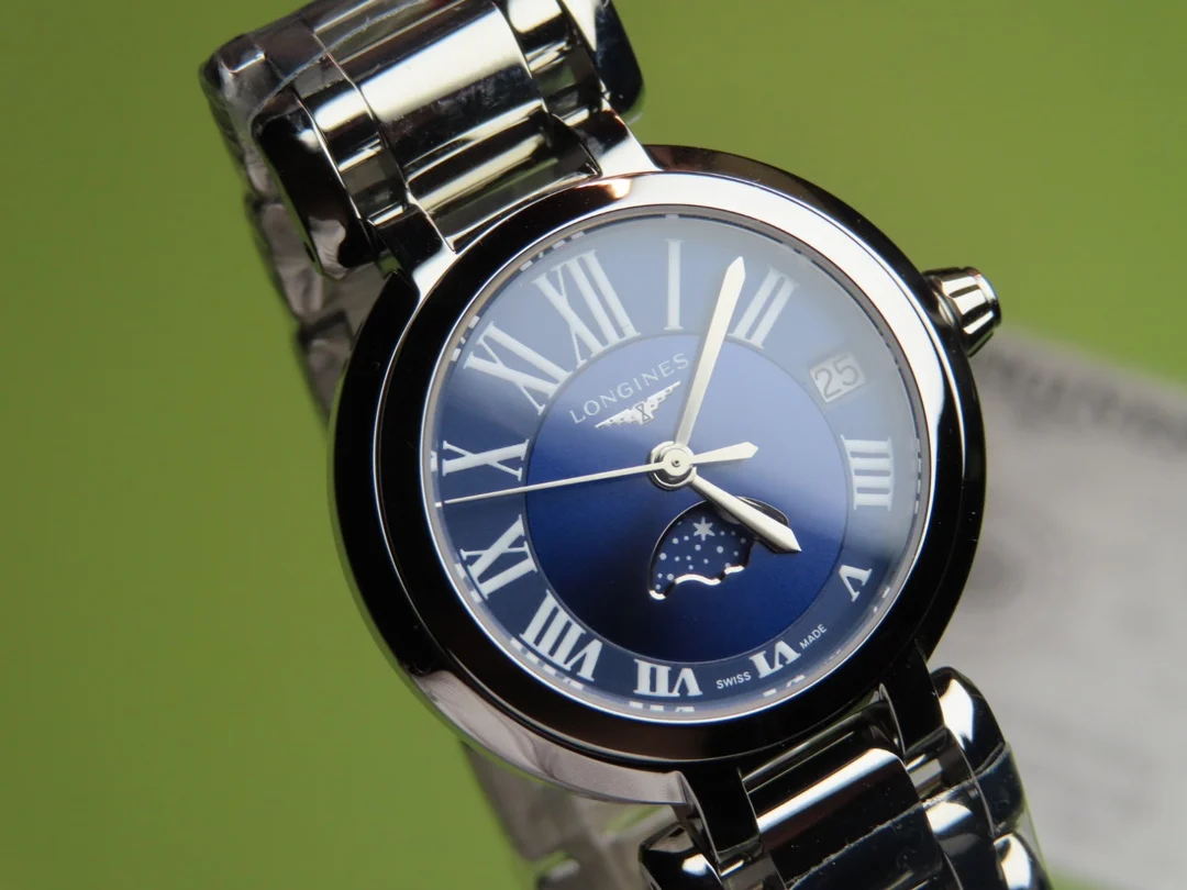 etc Longines New Heart Moon Collection Women's Model Watch — photographed off the sweep