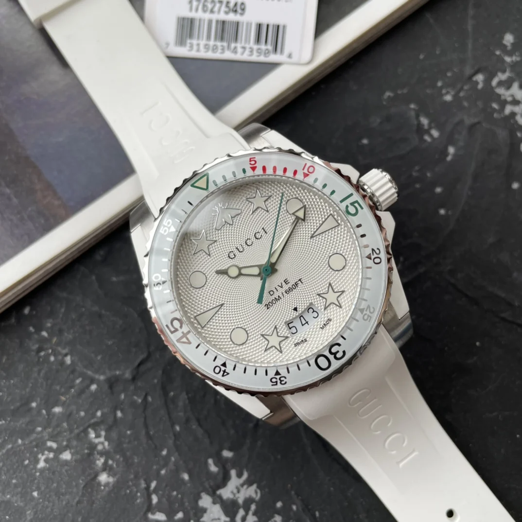 Gucci rubber strap sports watch, 40mm case diameter, sapphire — photographed off the sweep