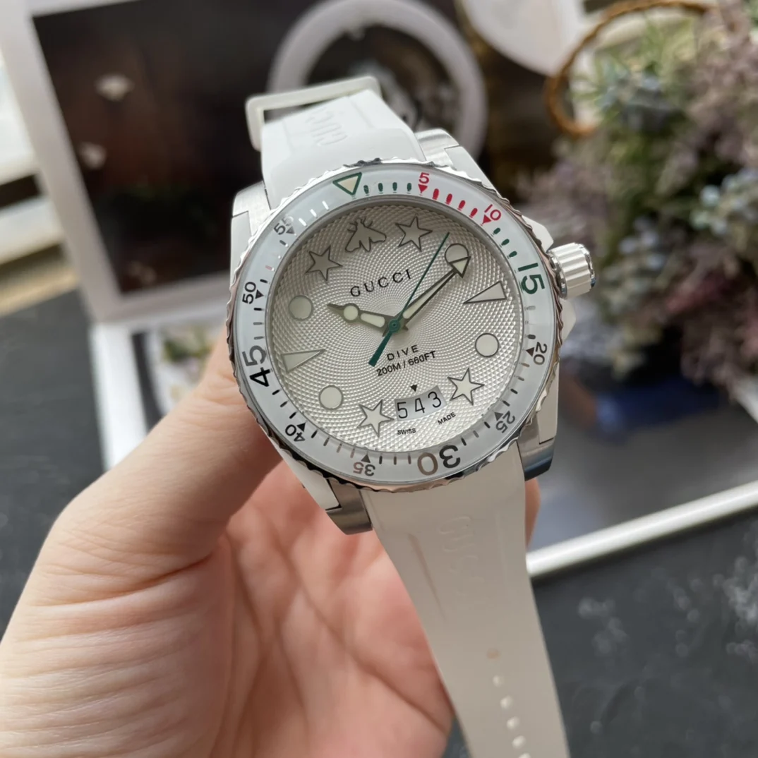 Gucci rubber strap sports watch, 40mm case diameter, sapphire — photographed off the sweep