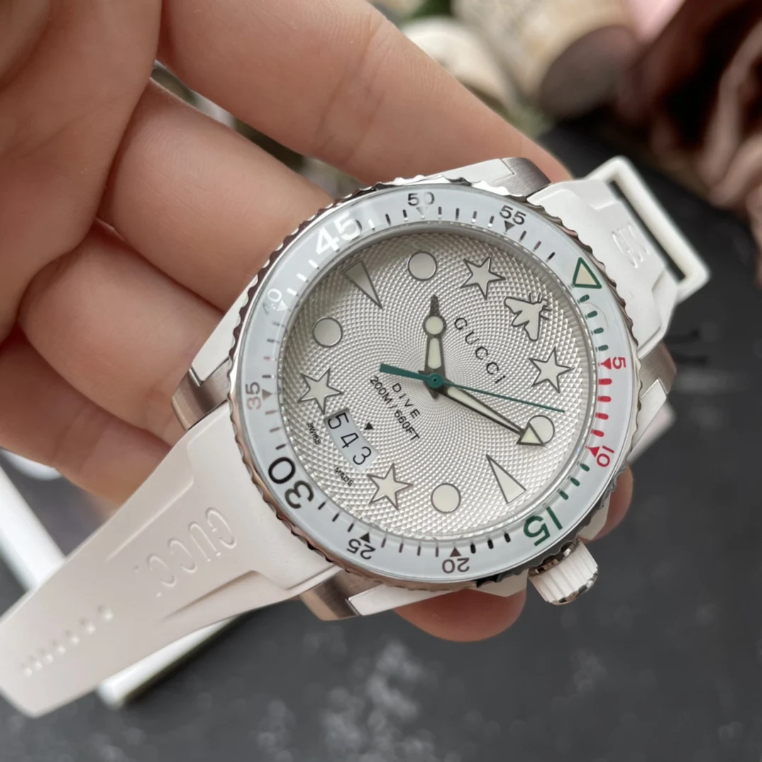 Gucci rubber strap sports watch, 40mm case diameter, sapphire — photographed off the sweep