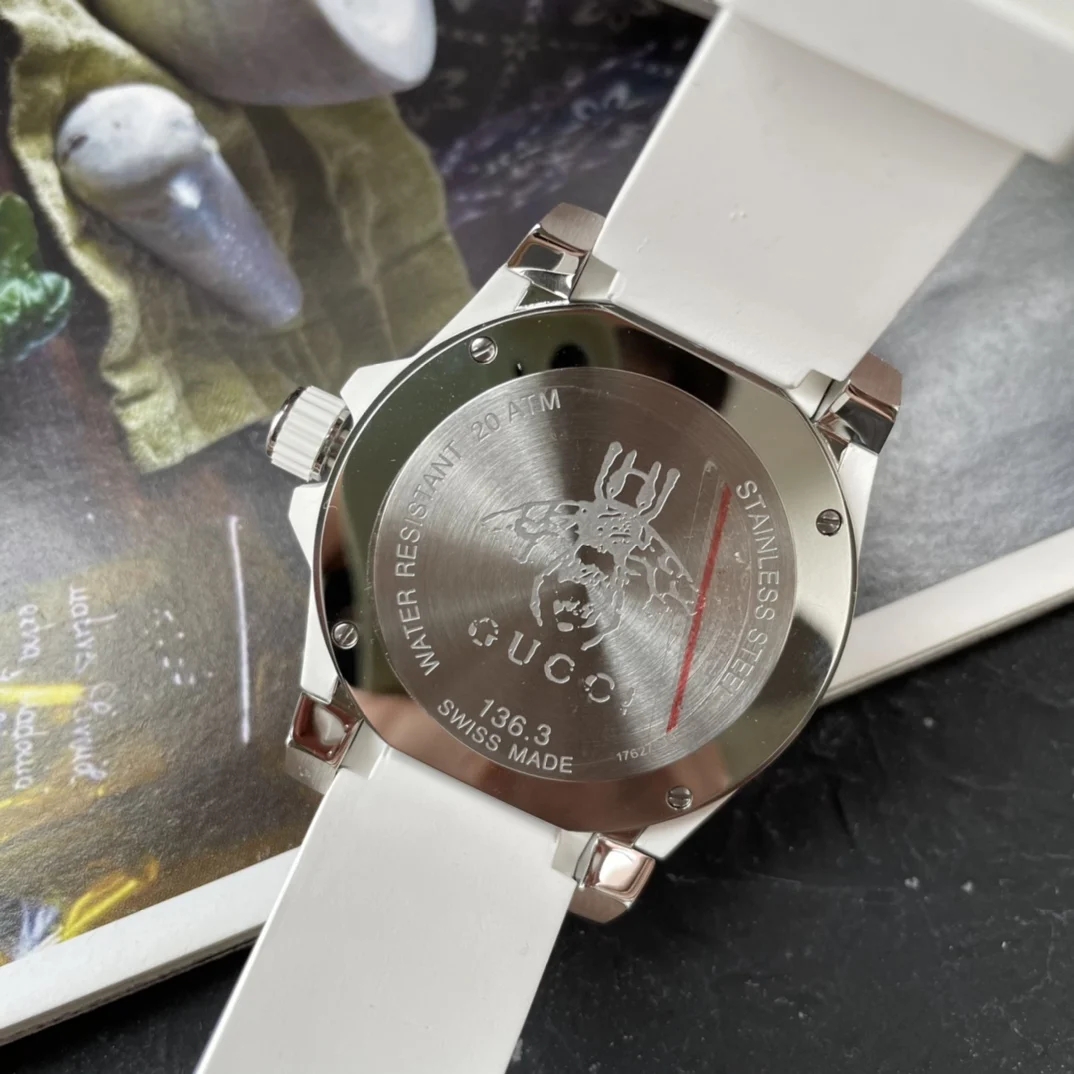 Gucci rubber strap sports watch, 40mm case diameter, sapphire — photographed off the sweep