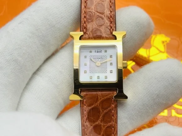 Hermès Steel Red Dial