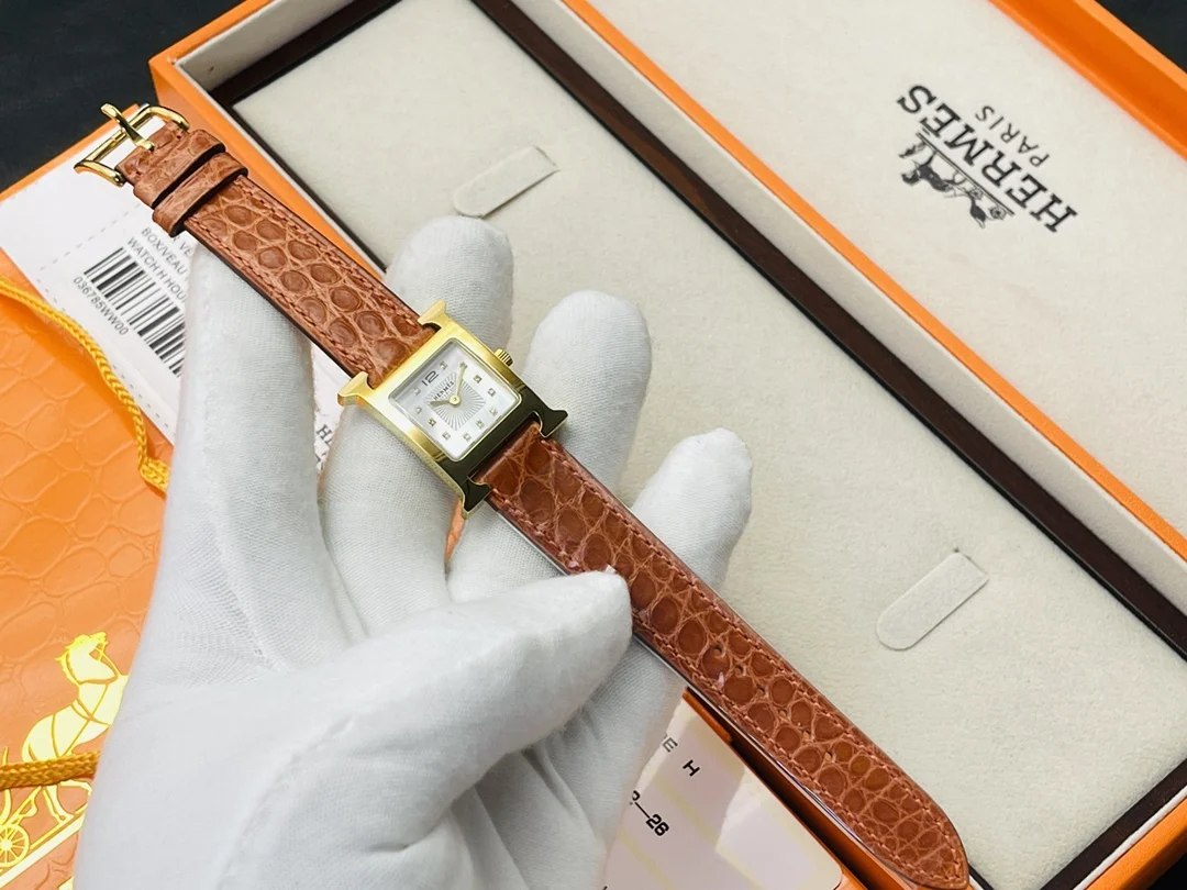 Hermès Steel Red Dial — photographed off the sweep