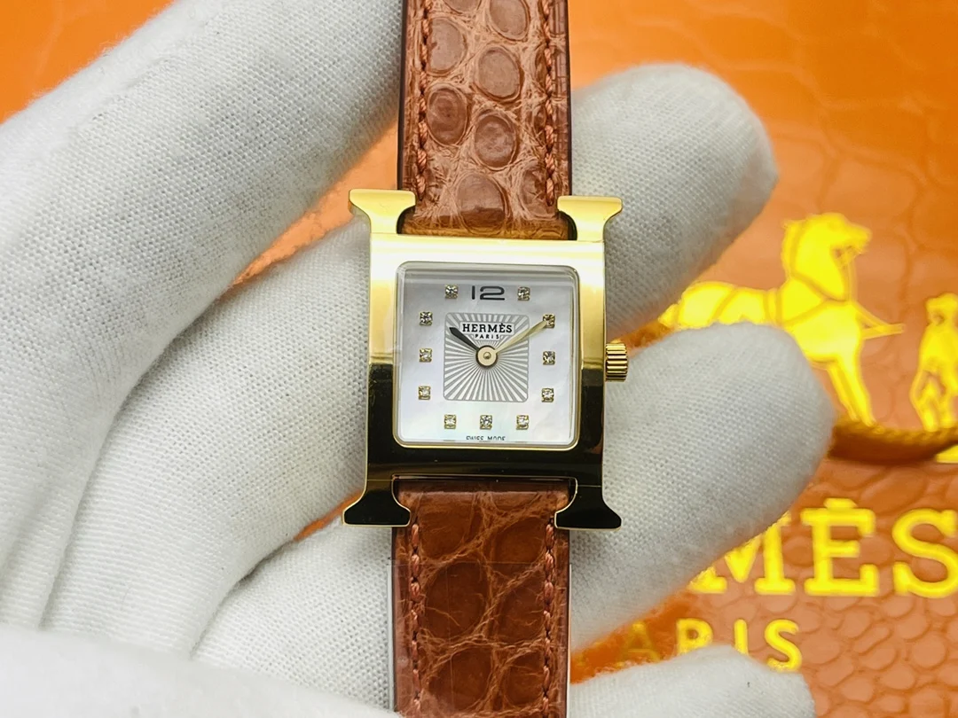 Hermès Steel Red Dial — photographed off the sweep